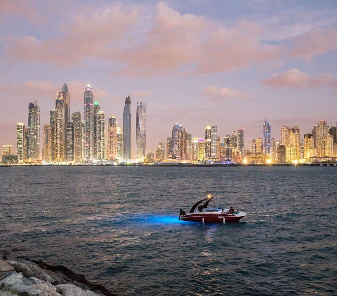 National Geographic Travelさんのインスタグラム写真 - (National Geographic TravelInstagram)「Photo by @lucalocatelliphoto | Dubai Marina at night. In a single generation, Dubai exploded from a humble port to a metropolis. Electricity and paved roads arrived in 1961. Oil funded expansion in the 1970s. The building boom—including artificial islands—accelerated in the 2000s. The pace has slowed since the 2008 financial crisis, but the city continues to rise up and out. A decade ago Dubai had one of the largest ecological footprints of any city in the world. By 2050 it wants to have the smallest. Can it get there? My work revolves around the making of the future, how our society transitions through new ways of living, and how technology is changing our approach to the environment and to our cities. I’ve embarked on a journey with @natgeo to showcase how Dubai aims to become one of the world’s greenest cities. Follow me @lucalocatelliphoto to find out more about the Dubai story I covered for @natgeo #Dubai #environment #beach #sea #people #city」5月28日 10時05分 - natgeotravel