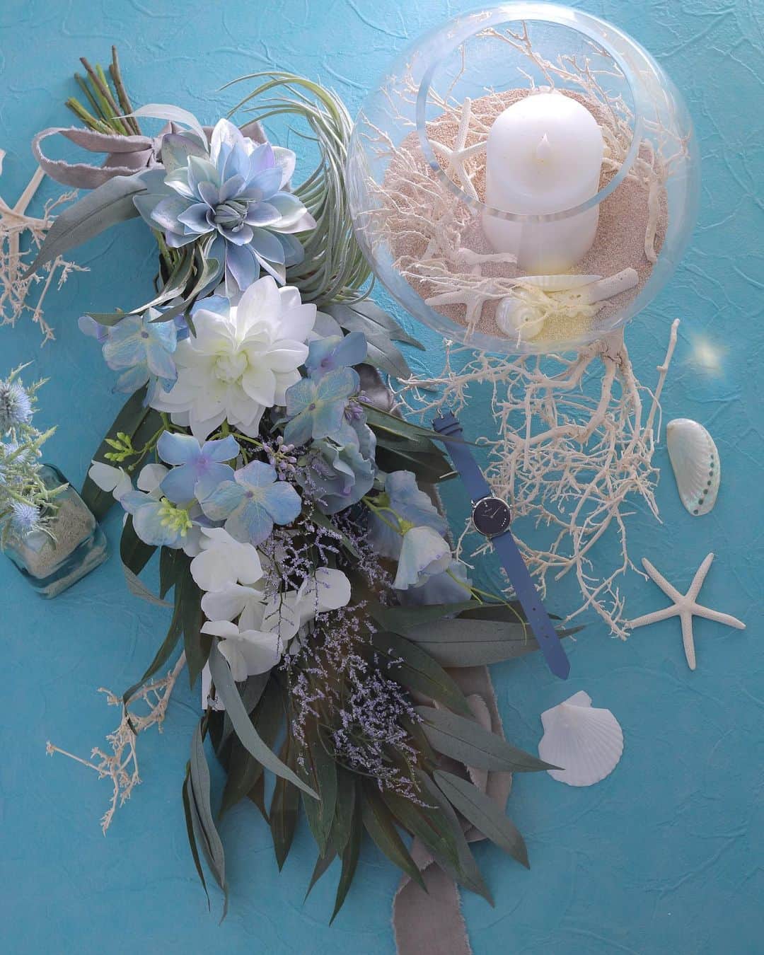 東京堂アーティフィシャルフラワーMAGIQさんのインスタグラム写真 - (東京堂アーティフィシャルフラワーMAGIQInstagram)「・ 【アーティフィシャルで季節を迎える】〜Summer Collection(サマーコレクション) ・ 深い海を思わせるブルーの花々は 落ち着きがありながらも美しく 上品な輝きが大人エレガントを演出します。 ・ 【お知らせ】 東京堂 アーティス1F 入り口にて、 この写真のシリーズ"Abyss Brilliant(アビスブリリアント)のディスプレイを展開中です❗️ ・ FM4865 ①⑤ デューブライトダリア FM4861 ①⑤ デューブライトハイドレンジア FM4863 ⑤  デューブライトスイトピー(＊好評につき今期完売) FM8832 ⑪ ジャルダンスターチス (＊好評につき今期完売) FG6761 ⑮ バンブーユーカリブランチ FG1836  ティランジアドゥラティ ・ ＊ ＊ ＊ 〜＊〜@liakulea_japan ×  @magiq.jp collaboration 〜＊〜 ＊ ＊ ＊ ●Use my code 👉magiq.jp to get an additional 10%discount (期限なし)送料無料 ●official online Store👉 https://pom.me/liakulea_japan/ ＊ ＊ ＊ #TOKYODO#MAGIQ#MAGIQのある暮らし#東京堂#アーティフィシャルフラワー#アーティフィシャル#アートフラワー#造花#花のある暮らし#花のある生活 #花好きな人と繋がりたい#フラワーデザイン#フラワーアレンジメント#フラワーアレンジ#アレンジメント#ダリア#置き画#wedding #artificial#artificialflower#bluewedding #リアクレア#liakulea#腕時計#時計#腕時計倶楽部#手元倶楽部」5月14日 17時28分 - magiq.jp