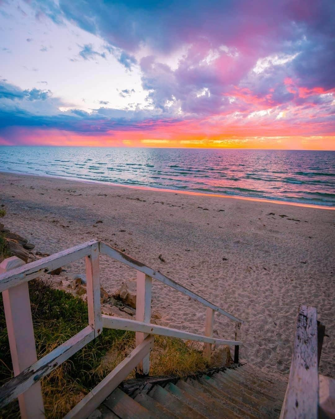 Australiaさんのインスタグラム写真 - (AustraliaInstagram)「This #sunset at @southaustralia’s #HenleyBeach is what we call a “real beaut”. 😎🌅 According to @nathangodwin, after witnessing this spectacular evening, he hasn’t “seen a better sunset since!” An easy 20-minute drive from #Adelaide, @visithenleybeach has much more than just good looks - grab a bite and some drinks beachside at @malobo.terrace, @bacchushenleybeach or @littleshoohenley, then take a stroll down the street for some shopping. It goes without saying that you should stick around till sunset to see this kind of colourful skies in person.  #seeaustralia #seesouthaustralia #travel #explore」5月14日 20時00分 - australia