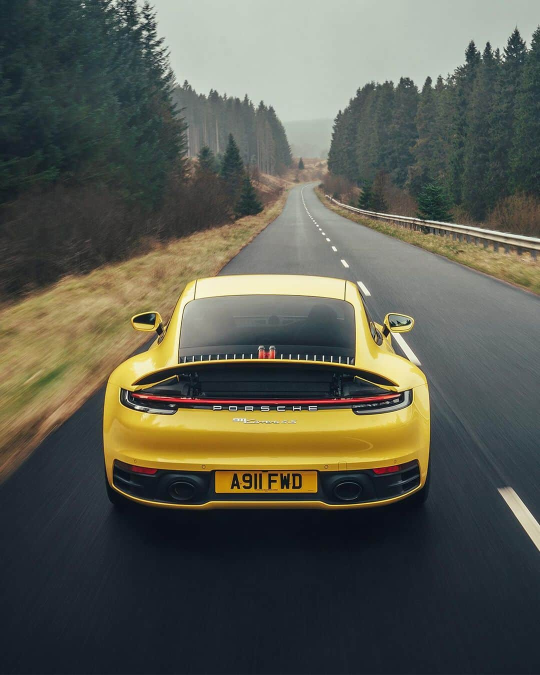 Porscheさんのインスタグラム写真 - (PorscheInstagram)「Racing Yellow makes even the cloudiest day look sunny. Hit the road with a Porsche 911 Carrera 4S in this gallery. #NewPorsche911 #TimelessMachine #Porsche #992 #Porsche911 #RacingYellow  __ Combined fuel consumption in accordance with EU 6: 911 Carrera 4S: 9.0 l/100 km, CO2 emissions: 206 g/km」5月14日 23時16分 - porsche