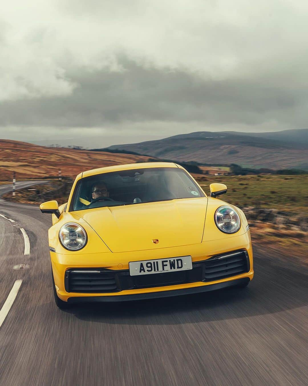 Porscheさんのインスタグラム写真 - (PorscheInstagram)「Racing Yellow makes even the cloudiest day look sunny. Hit the road with a Porsche 911 Carrera 4S in this gallery. #NewPorsche911 #TimelessMachine #Porsche #992 #Porsche911 #RacingYellow  __ Combined fuel consumption in accordance with EU 6: 911 Carrera 4S: 9.0 l/100 km, CO2 emissions: 206 g/km」5月14日 23時16分 - porsche