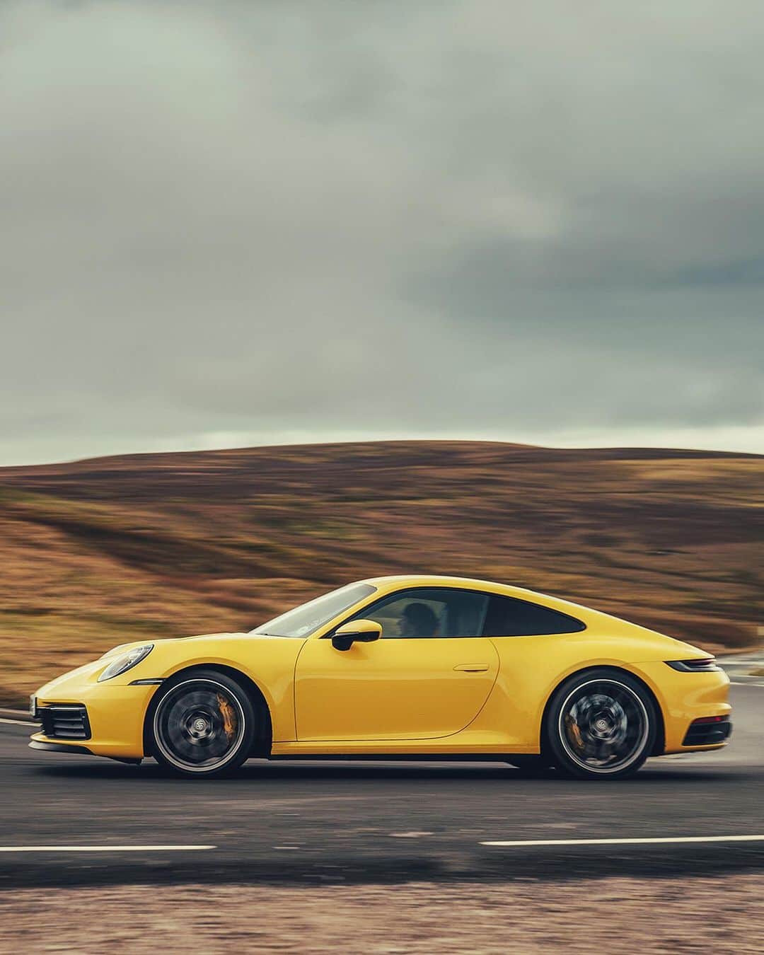 Porscheさんのインスタグラム写真 - (PorscheInstagram)「Racing Yellow makes even the cloudiest day look sunny. Hit the road with a Porsche 911 Carrera 4S in this gallery. #NewPorsche911 #TimelessMachine #Porsche #992 #Porsche911 #RacingYellow  __ Combined fuel consumption in accordance with EU 6: 911 Carrera 4S: 9.0 l/100 km, CO2 emissions: 206 g/km」5月14日 23時16分 - porsche