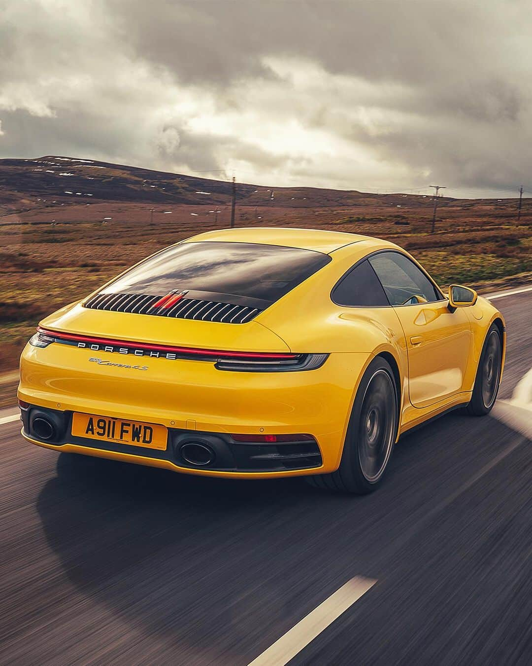 Porscheさんのインスタグラム写真 - (PorscheInstagram)「Racing Yellow makes even the cloudiest day look sunny. Hit the road with a Porsche 911 Carrera 4S in this gallery. #NewPorsche911 #TimelessMachine #Porsche #992 #Porsche911 #RacingYellow  __ Combined fuel consumption in accordance with EU 6: 911 Carrera 4S: 9.0 l/100 km, CO2 emissions: 206 g/km」5月14日 23時16分 - porsche