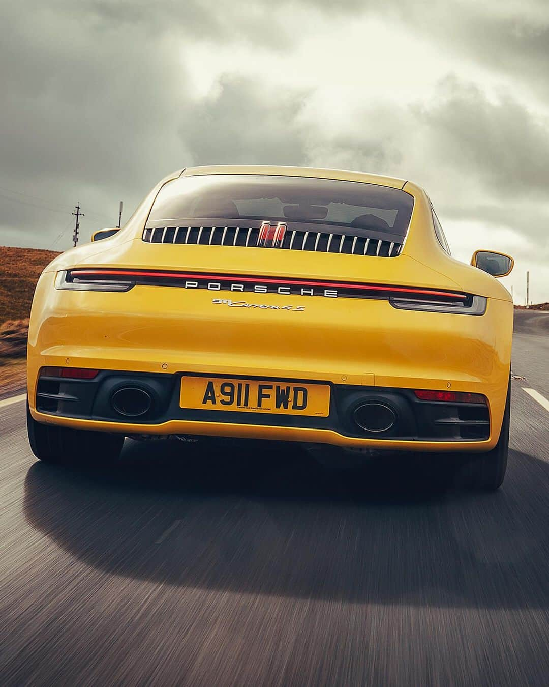 Porscheさんのインスタグラム写真 - (PorscheInstagram)「Racing Yellow makes even the cloudiest day look sunny. Hit the road with a Porsche 911 Carrera 4S in this gallery. #NewPorsche911 #TimelessMachine #Porsche #992 #Porsche911 #RacingYellow  __ Combined fuel consumption in accordance with EU 6: 911 Carrera 4S: 9.0 l/100 km, CO2 emissions: 206 g/km」5月14日 23時16分 - porsche