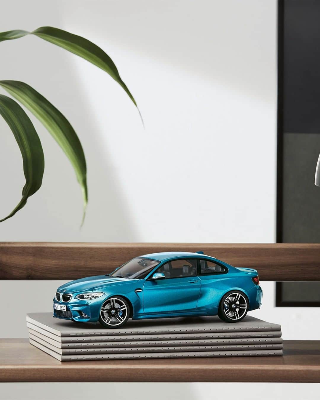 BMWのインスタグラム：「Size does not matter when it comes to detailed beauty. The Miniature BMW M2 in Long Beach Blue Metallic. @bmwlifestyle #mybmwlifestyle」