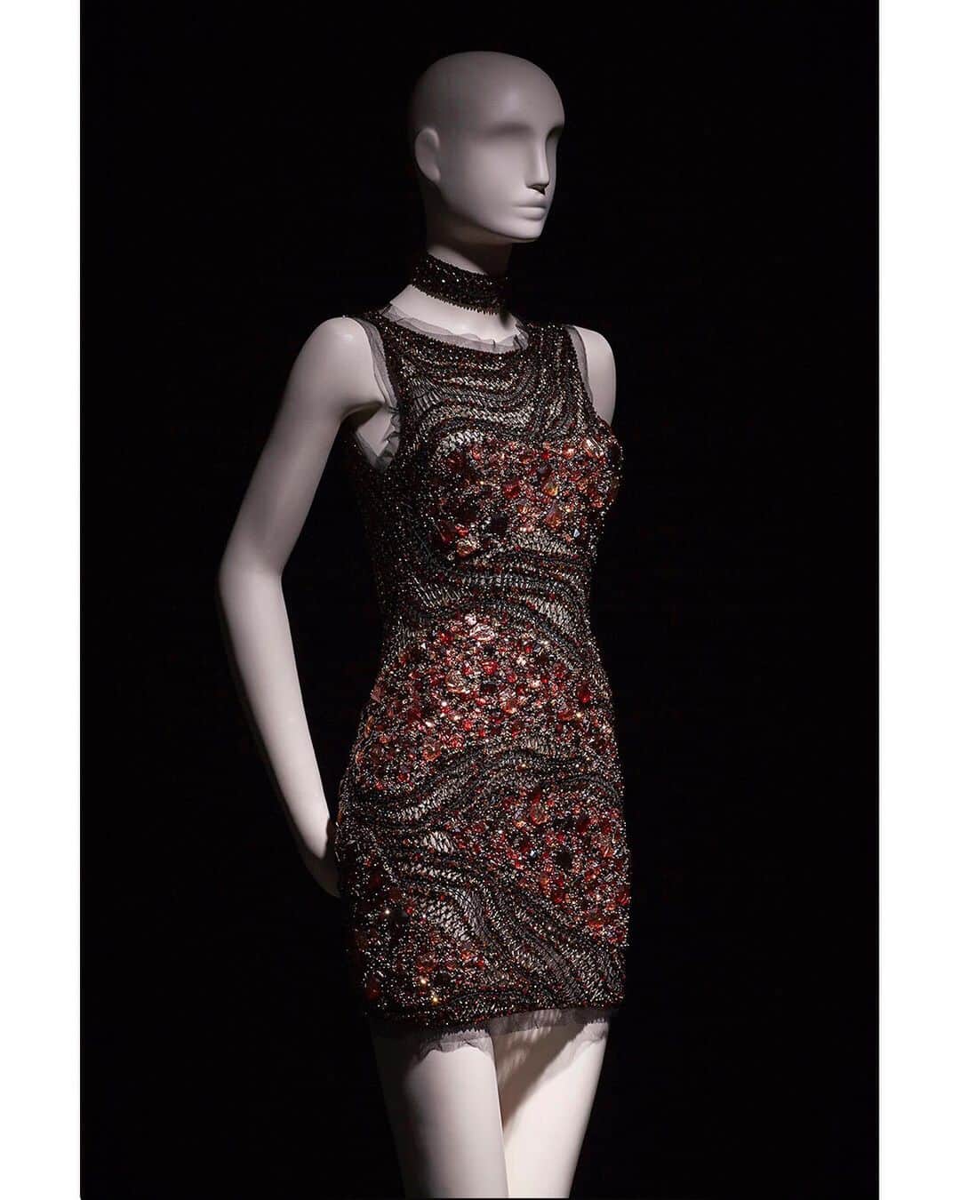 のインスタグラム：「Amina - Short gown with intricate embroidery made of amber stones of different shapes and colour shades. A burst of beaded splendor from the new "Divina Africa" #RobertoCavalliCouture collection exclusively available at our Cannes Boutique.」