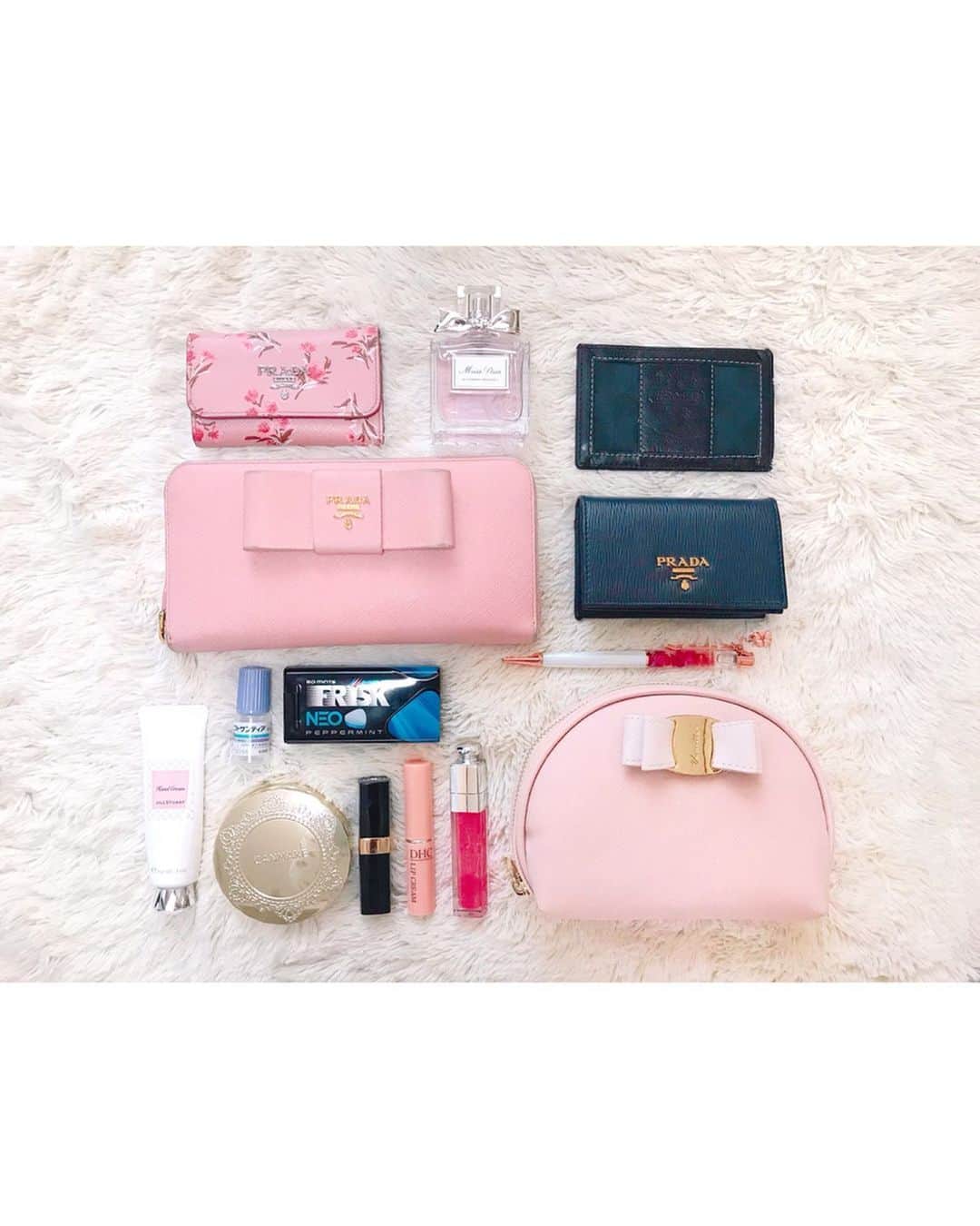 沢井里奈さんのインスタグラム写真 - (沢井里奈Instagram)「♡ . この前の土日の栄は歩行者天国でした🌹🌸 ホコ天ってテンション上がる☺️💓💓 . . 質問頂いたバックとポーチの中身、 よく使うコスメはこんな感じです👜💐💕💕 質問ありがとうございます🥺❤️ 少しでも参考になったら嬉しいです😢✨ . 普段よく使っているバックは Saint Laurentのものです！！ . . 【写真③】 バックの中身 . 【写真④】毎日メイク 🎀SUQQU デザイニング カラー アイズ 04 🎀CLIO プリズムエアシャドウ スパークリング 🎀CLIO プロシンクルシャドウ # G10 🎀THREE シマリング グロー デュオ 01 🎀IPSA クリエイティブコンシーラー EX 🎀KATE デザイニングアイブロウ3D EX-4 ライトブラウン系 🎀Elegance ラ プードル オートニュアンス Ⅳ 🎀JILLSTUART ミックスブラッシュ コンパクト モアカラーズ 22 🎀CEZANNE シェーディングスティック 01 🎀the SAEM チップコンシーラー 1.5 🎀PAUL＆JOE モイスチュアライジングファンデーション プライマー S 01 🎀MAQuillAGE ビューラー 🎀CANMAKE マシュマロフィニッシュパウダーMO 🎀KATE 3Dアイブロウカラー BR-2 ナチュラルアッシュ 🎀Love Liner リキッドアイライナー R2 DBR 🎀ヒロインメイク ボリューム＆カール ブラウン 🎀CHANEL ルージュココシャイン91 🎀Dior アディクトリップ マキシマイザー 007 ラズベリー 🎀B IDOL つやぷるリップ 01 ずるいPINK 🎀B IDOL つやぷるリップ 101 むちゅうGLITTER . 【写真⑤】 ARTISAN＆ARTISTの Barbieとのコラボポーチ💄💕💕 その他は無印の透明のケースに🌟 . 【写真⑥】ヘアケア 🎀ミルボン エルジューダ ポイントケアスティック 🎀ザ・プロダクト ヘアワックス 🎀ウテナ マトメージュ 🎀ANNA SUI ヘアブラシ 🎀ネイルケアオイル . 【写真⑦】 ソーイングセットなど . 【写真⑧】サブバック お仕事の時はとにかく荷物が多いので COACHかlerevevanillerの トラベルバック👜💕💕 シェリーメイちゃんのメイクポーチ💄✨ . . #さわーコーデ 👗💝 onepiece♡ #apuweiserriche  pump♡ #diana . #sqqu #clio #three #ipsa #kate #elegance #jillstuart #chanel #dior #bidol #artisanandartist #barbie #coach #lerevevaniller #disney #makeup #カバンの中身 #ポーチの中身 #メイクポーチ #バニティポーチ #愛用コスメ #メイク #毎日メイク #メイクアップ #さわーコスメ #沢井里奈」5月16日 20時14分 - sawairina