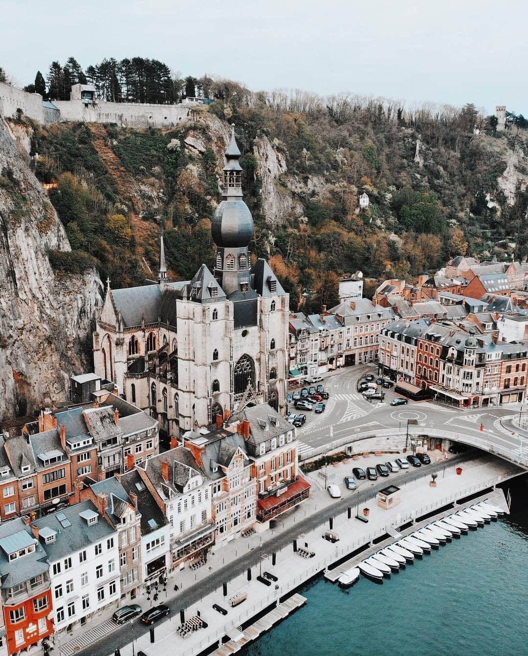 Travel + Leisureさんのインスタグラム写真 - (Travel + LeisureInstagram)「On a slim stretch of land between steep cliffs and the Meuse River sits Dinant, a historic town in Belgium’s French-speaking Wallonia region. See 21 other postcard-perfect European villages straight out of a fairy tale - link in bio! #tlpicks courtesy of @sofikulin」5月17日 4時14分 - travelandleisure