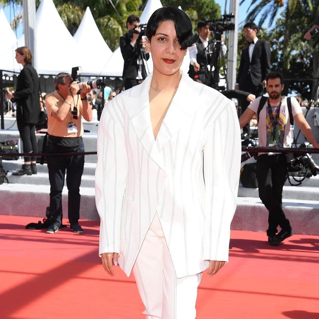 のインスタグラム：「Musician, Fatima Al Qadiri wore a custom white multi-seam suit for the premiere of Atlantics for which she composed the original soundtrack. - - Creative Director @cadwallader  #fatimaalqadiri  #mugler」
