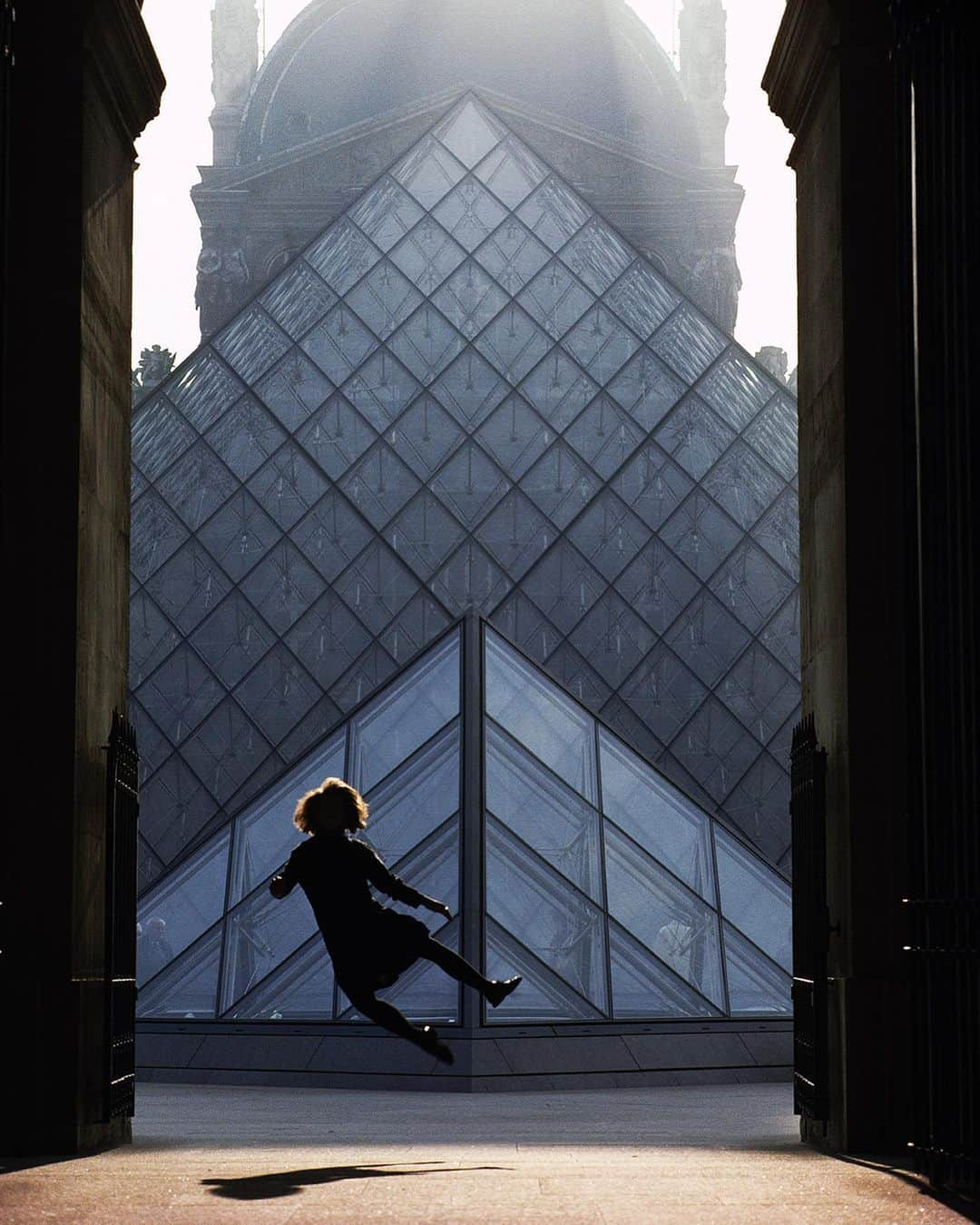 National Geographic Creativeさんのインスタグラム写真 - (National Geographic CreativeInstagram)「Photo by James L. Stanfield | A young Parisian girl kicks up her heels outside the pyramid of the Louvre, designed by the legendary architect I. M. Pei. #IMPei #Architect #France」5月18日 5時02分 - natgeointhefield