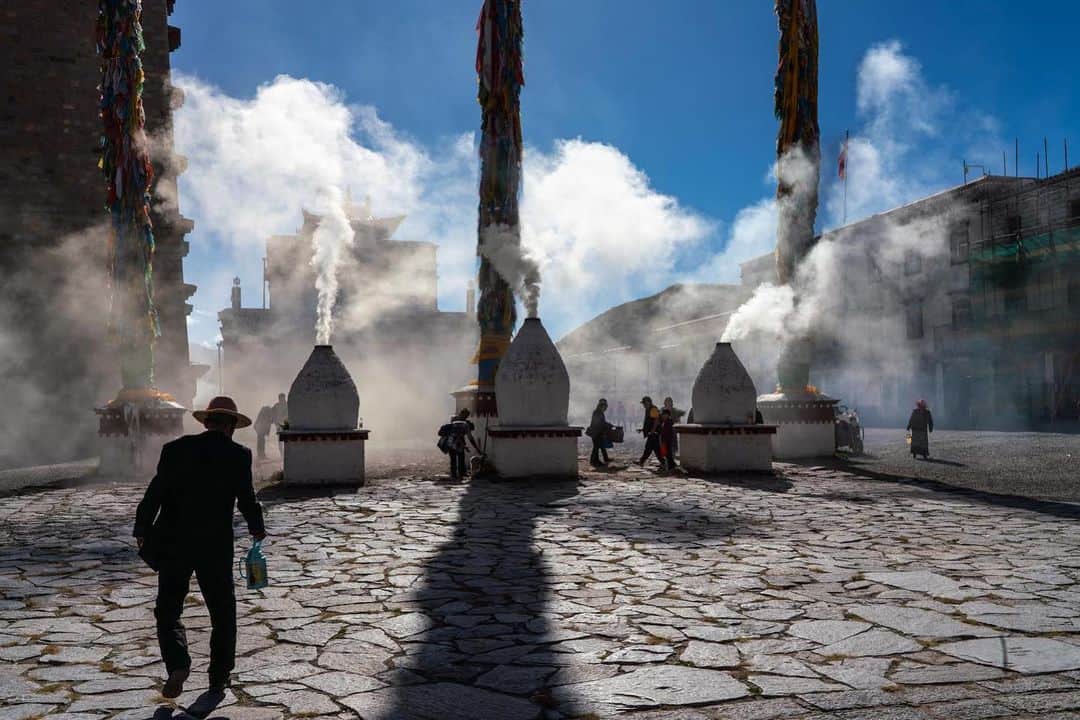 thephotosocietyさんのインスタグラム写真 - (thephotosocietyInstagram)「Photo by Michael Yamashita @yamashitaphoto | Burning juniper branches as an incense offering to the gods is practiced in a big way at Samye Monastery. Three big incense burners between the prayer poles keep the courtyard filled with smoke. There are still some spots available for my photography workshop in Tibet this fall. Visit @visionarywild for all the details.  #samye #incense #tibet #photoworkshop #tibetanbuddhism」5月17日 22時10分 - thephotosociety