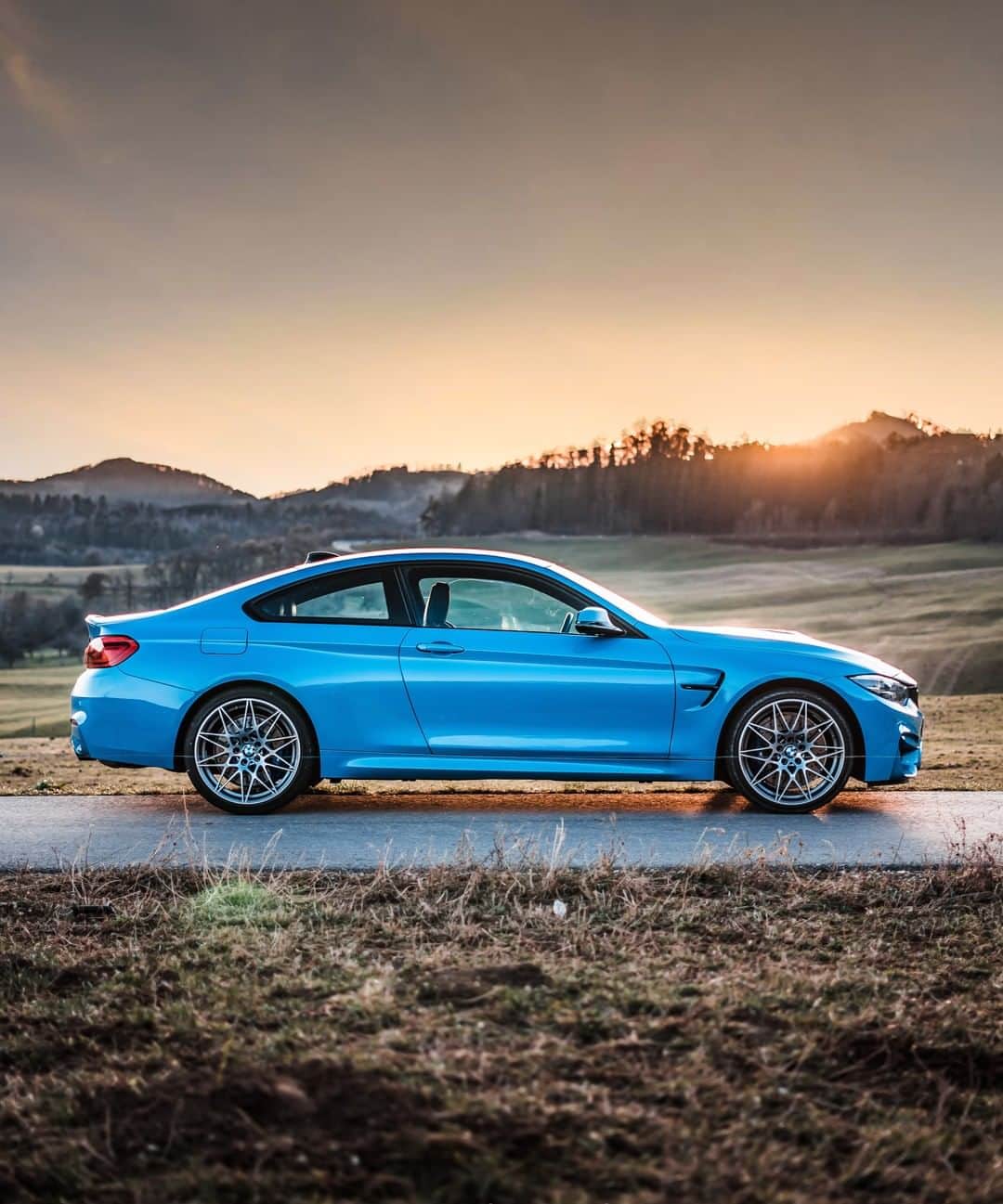 BMWのインスタグラム：「Brings color to your life. The BMW M4 Coupé. #BMWrepost @max.carphotography @m4_bluebeast __ BMW M4 Coupé: Fuel consumption in l/100 km (combined): 10.2 - 9.9 (9.5 - 9.3). CO2 emissions in g/km (combined): 232 - 225 (217 - 211). The figures in brackets refer to the vehicle with seven-speed M double-clutch transmission with Drivelogic. The values of fuel consumptions, CO2 emissions and energy consumptions shown were determined according to the European Regulation (EC) 715/2007 in the version applicable at the time of type approval. The figures refer to a vehicle with basic configuration in Germany and the range shown considers optional equipment and the different size of wheels and tires available on the selected model. The values of the vehicles are already based on the new WLTP regulation and are translated back into NEDC-equivalent values in order to ensure the comparison between the vehicles. [With respect to these vehicles, for vehicle related taxes or other duties based (at least inter alia) on CO2-emissions the CO2 values may differ to the values stated here.] The CO2 efficiency specifications are determined according to Directive 1999/94/EC and the European Regulation in its current version applicable. The values shown are based on the fuel consumption, CO2 values and energy consumptions according to the NEDC cycle for the classification. For further information about the official fuel consumption and the specific CO2 emission of new passenger cars can be taken out of the „handbook of fuel consumption, the CO2 emission and power consumption of new passenger cars“, which is available at all selling points and at https://www.dat.de/angebote/verlagsprodukte/leitfaden-kraftstoffverbrauch.html.」