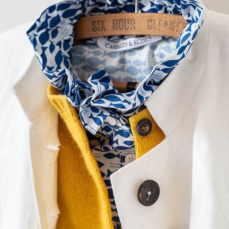 キャベジズ&ローゼズのインスタグラム：「Make your own sunshine 🐟💛☀️🐳 with the fishes Fredericka shirt in the finest poplin and sunshine yellow Grace cardigan made in Scotland.  #colourpop #happy #cheerful #summercolours #cabbagesandroses #cabbagesandrosesfashion #scottishknitwear #britishfashion #sustainablefashion #limitededition」