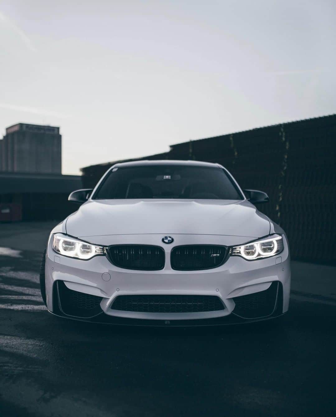 BMWのインスタグラム：「Starting the night shift. The BMW M3 Sedan. #BMWrepost @visuals.by_oj @adel_hsc #BMW #M3 __ BMW M3 Sedan: Fuel consumption in l/100 km (combined): 8.8 (8.3). CO2 emissions in g/km (combined): 204 (194). The figures in brackets refer to the vehicle with seven-speed M double-clutch transmission with Drivelogic. The values of fuel consumptions, CO2 emissions and energy consumptions shown were determined according to the European Regulation (EC) 715/2007 in the version applicable at the time of type approval. The figures refer to a vehicle with basic configuration in Germany and the range shown considers optional equipment and the different size of wheels and tires available on the selected model. The values of the vehicles are already based on the new WLTP regulation and are translated back into NEDC-equivalent values in order to ensure the comparison between the vehicles. [With respect to these vehicles, for vehicle related taxes or other duties based (at least inter alia) on CO2-emissions the CO2 values may differ to the values stated here.] The CO2 efficiency specifications are determined according to Directive 1999/94/EC and the European Regulation in its current version applicable. The values shown are based on the fuel consumption, CO2 values and energy consumptions according to the NEDC cycle for the classification. For further information about the official fuel consumption and the specific CO2 emission of new passenger cars can be taken out of the „handbook of fuel consumption, the CO2 emission and power consumption of new passenger cars“, which is available at all selling points and at  http://www.dat.de/angebote/verlagsprodukte/leitfaden-kraftstoffverbrauch.html.」