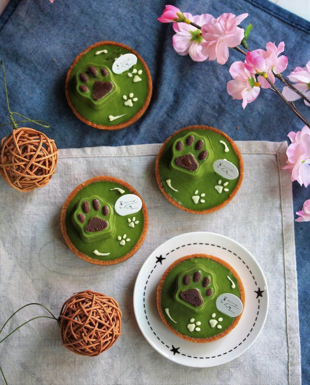 Li Tian の雑貨屋さんのインスタグラム写真 - (Li Tian の雑貨屋Instagram)「{NEW} Say Hello to Waffy ~🐶🐶🐶 A minimalist matcha tart of intense matcha ganache, black sesame feuilettine, Okinawan black sugar curd within the lighter matcha 🐾 . All fitted prettily inside an aromatic tart base made with @isignystemere churned butter  Have been working on it since last year and I’m so happy they are finally ready~ Why Waffy? Cos it’s Waffles + Goofy, the beloved dogs of my two dear buddies • • Orders now open for collection from 2 June~ (Every weekends and Mondays only)  Cut off day for orders: every tues of the week  Price : $16/2pc or $30/4pc  For full menu pls see highlighted IG story on profile page • • •  #dairycreamkitchen #singapore #desserts #igersjp #yummy #love #sgfood #foodporn #igsg #ケーキ  #instafood #gourmet #beautifulcuisines #onthetable #bonappetit #cafe #cake #f52grams #bake #sgcakes #スイーツ #cakes #feedfeed #chocolate #pastry #sgcafe #抹茶 #matcha #kawaii #cute」5月20日 13時36分 - dairyandcream