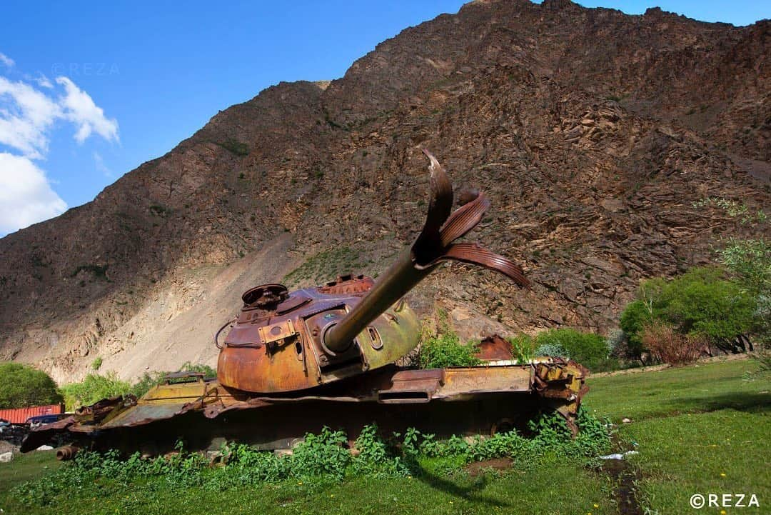 thephotosocietyさんのインスタグラム写真 - (thephotosocietyInstagram)「Photo by @rezaphotography #Afghanistan  Once Upon a time, the Russian Empire Panjshir Valley  The ravages of war invade memories and landscapes. In Afghanistan, a country was torn by decades of conflict, these “memories” left by the enemy are ubiquitous. The Soviet Army, which was defeated by the Afghan resistance, left the country in 1989. Ever since rusty tanks have been part of the landscape. They are often reused for the daily needs of the population – here for a bridge, there for a children’s playground, or even to dry hay. As part of the booty of war, they remain as symbols that, on the scale of the long history of humanity, even the greatest empires ultimately crumble into the dust.  Text by @Racheldeghati  The picture was taken while on assignment for the documentary Power of a photograph for National Geographic Channel.  #panjshirvalley #war #ravage #invasion #landscape #tank #memory #old #history #russianarmy #russian #abandon #remainder #afghan #conflict #resistance #afghanresistance #mountains #symbol #photooftheday #photojournalism #reza #rezaphoto #rezadeghati #rezaphotography #rezaphotojournalist #webistan」5月20日 10時25分 - thephotosociety