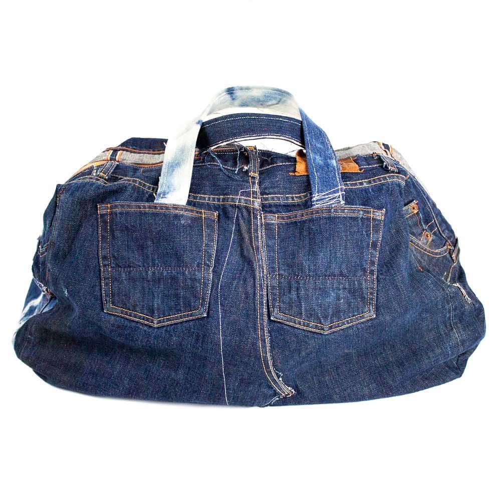 のインスタグラム：「Patchwork Denim Duffle Bag— What better to do with old jeans that can no longer be worn or repaired?! Handmade in NYC by our friend and skilled artisan @davranov out of deadstock Jean Shop jeans. #reducereuserecycle #jeanshop #selvedgedenim #denimheads #jeanshopnyc #selvedge #indigo #denimduffle #patchworkdenim」