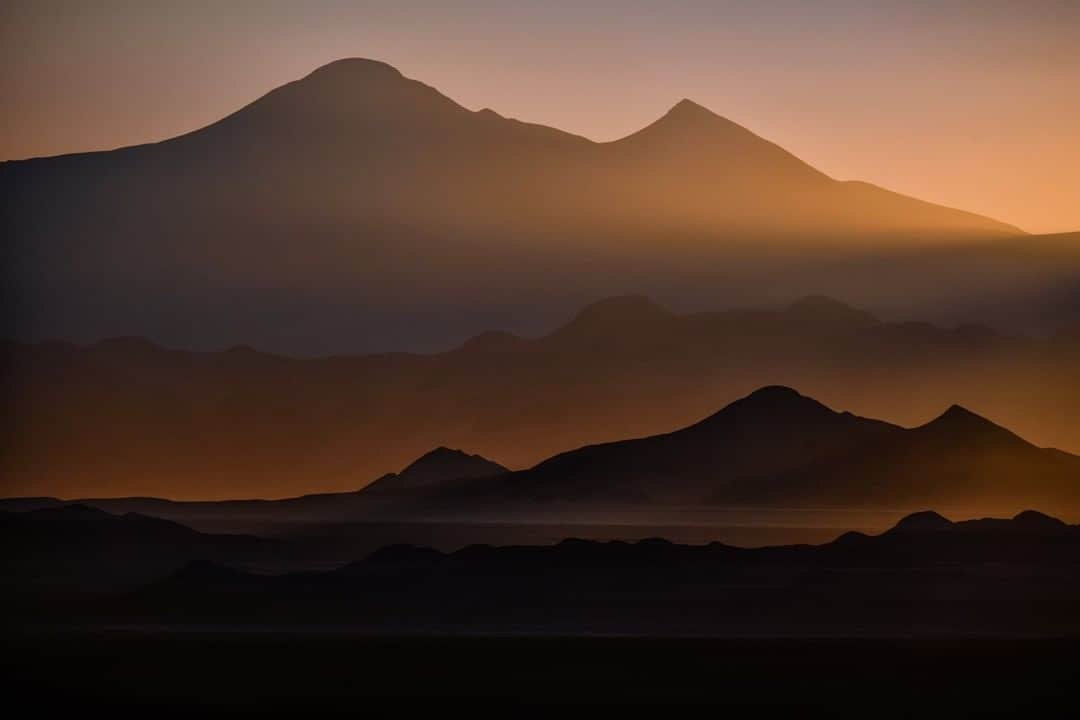 ナショナルジオグラフィックさんのインスタグラム写真 - (ナショナルジオグラフィックInstagram)「Photo by Keith Ladzinski @ladzinski | Dusty sunset over Argentina’s #AtacamaPlateau, an extraordinary high-altitude desert in the Salta Province. The plateau is a place of unique beauty, but also an area where life is hard. The average elevation is 14,800 feet and it sees less than an inch of rain annually.」5月21日 9時34分 - natgeo