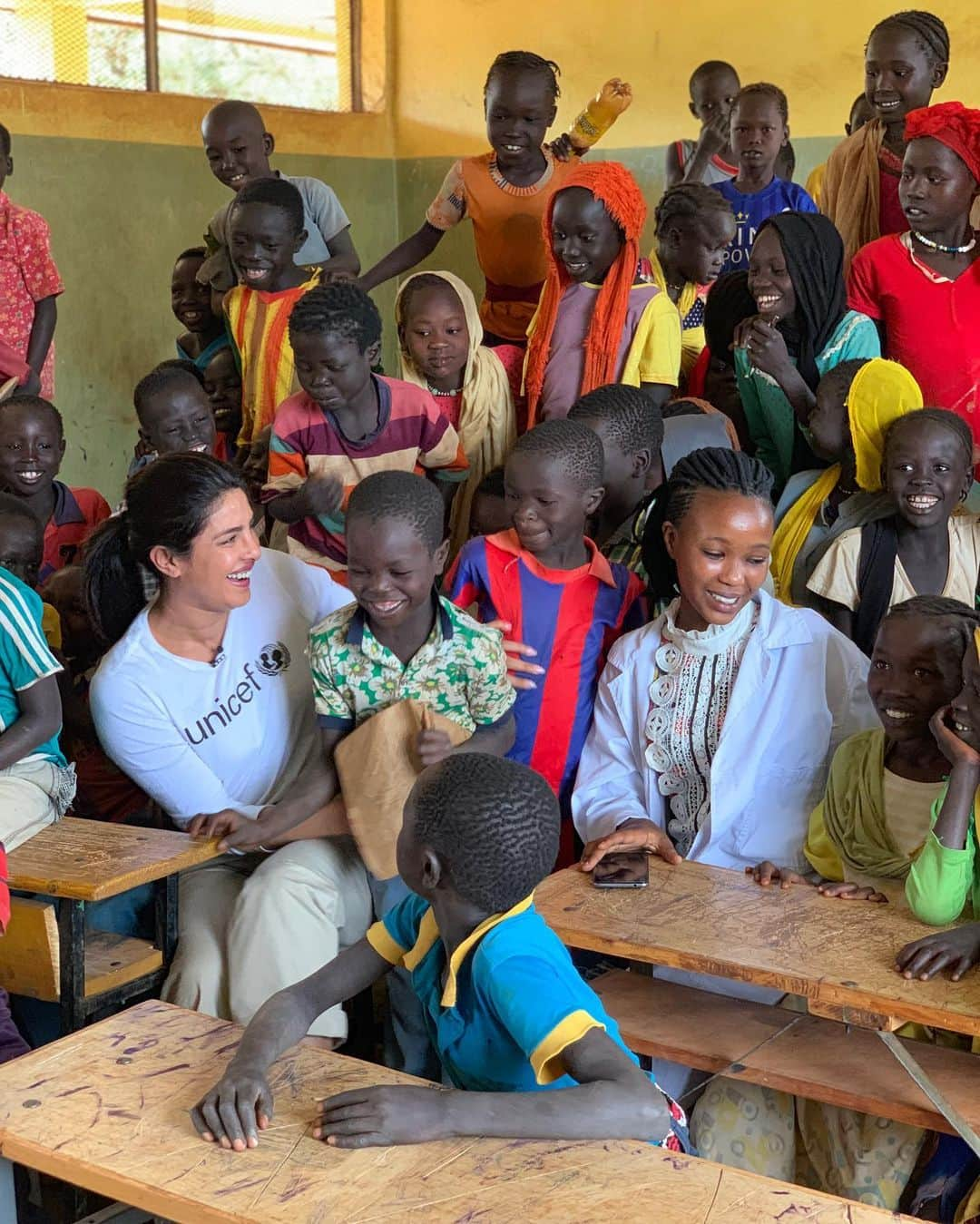 プリヤンカー・チョープラーさんのインスタグラム写真 - (プリヤンカー・チョープラーInstagram)「At the Bambasi Refugee Camp Primary School there is a shortage of trained teachers, with one teacher for every 89 students. This second grade class is taught by Hubahiro, she is a refugee child who is an 8th grade student at the school...she teaches grades 1-4 in the morning, and in the afternoon attends school to continue her education. Like her mother, who is also a refugee and teacher at the school, she earns a small stipend. When I first met the kids they were extremely introverted and timid. It took a lot of tickles and cuddles to get them to interact with me. Thank you Hubahiro for translating and helping the kids understand that I was a friend. @unicef @unicefethiopia #childrenuprooted」5月21日 21時47分 - priyankachopra