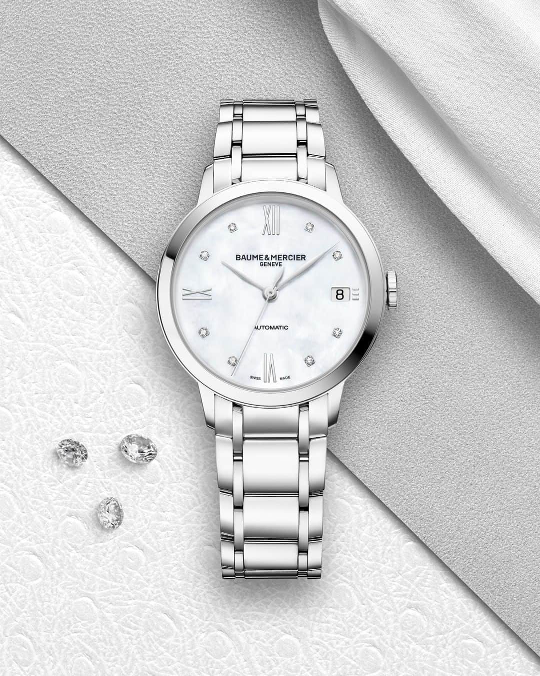 ボーンメルシーさんのインスタグラム写真 - (ボーンメルシーInstagram)「Introducing the Classima Lady 10496, with diamond indexes and a mother of pearl dial.  #timepiece #luxury #womenswatch #Classima #watchmaking #BaumeetMercier #luxury #Swiss #timepiece #ladywatches #diamondwatch #Swissmade #automaticwatch」5月21日 23時38分 - baumeetmercier