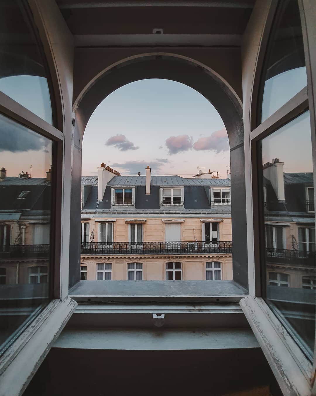 のインスタグラム：「My favorite window // the sun was slowly moving down in this spring time. Different from where I come from where we always have the sunset at 6pm all the year, here it changes within the season. Everyday the light is changing beautifully. Yet somehow i prefer this city with clouds. Soft light is the best option for the buildings in Paris to show off their beauty. And i'm the one who always love to watch the show.  Taken #withgalaxy #s10 @samsung_id」