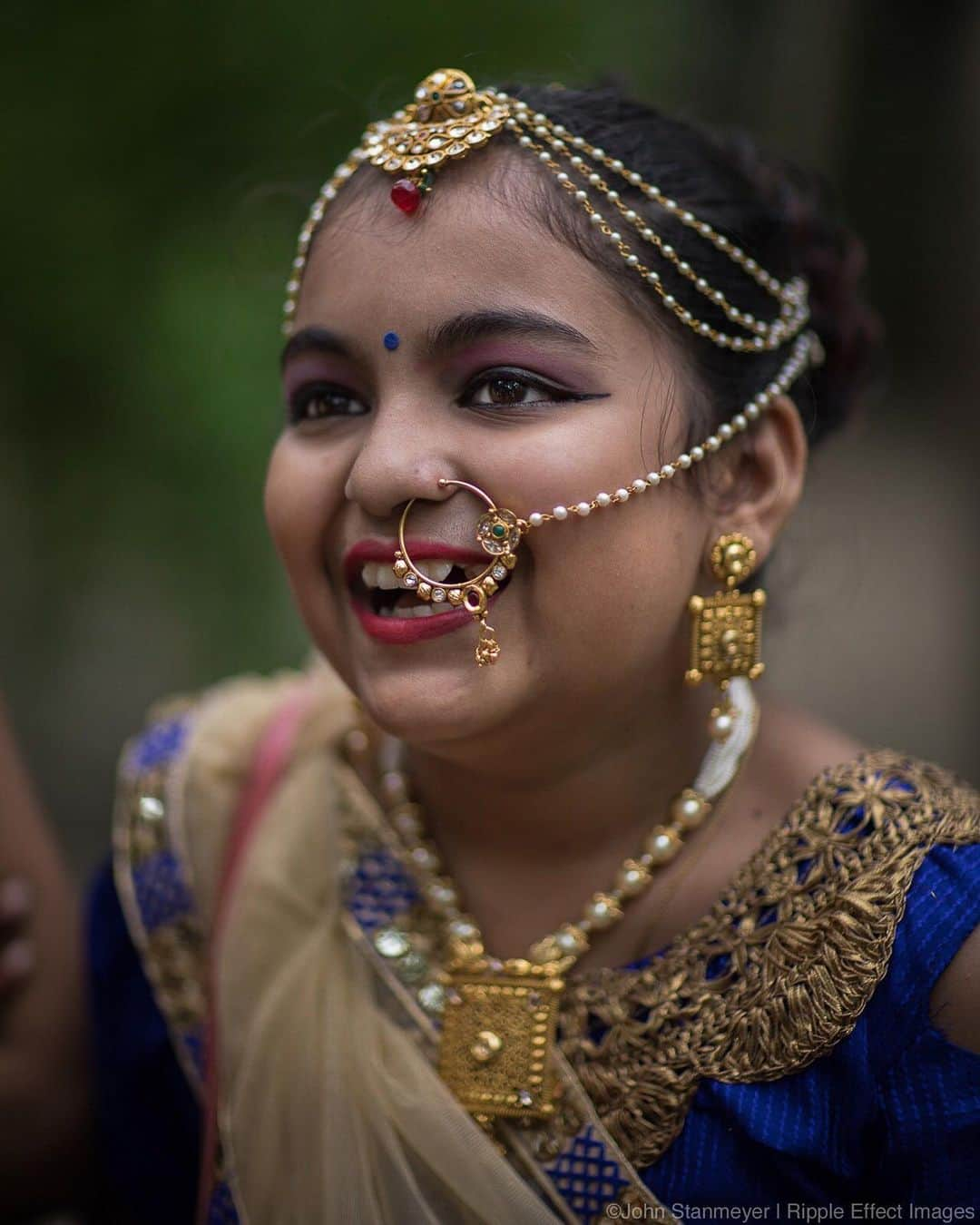 thephotosocietyさんのインスタグラム写真 - (thephotosocietyInstagram)「Photo by by @johnstanmeyer for @RippleEffectImages. This young girl is happy, healthy and unmarried because of a wonderful program where for every girl born, the village plants an entire grove of trees and new parents pledge to keep their daughters in school.  She is celebrating the Hindu holiday of Raksha Bandhan during which girls tie bracelets around their brother’s wrists, symbolizing the love and bond between brothers and sisters. In Piplantri, the girls tie bracelets around the trees, celebrating their bonds with the flourishing forest.  To learn more about programs that empower women and girls around the world, follow @rippleeffectimages and @johnstanmeyer.  @photography.for.good #PhotographyForGood #photojournalism #forceofnature #girls #empowerment #education #India #climateheroes #schools #piplantri #trees #forestforthetrees #arbordayeveryday #letgirlslearn #educateagirl #plantatree」5月23日 21時47分 - thephotosociety