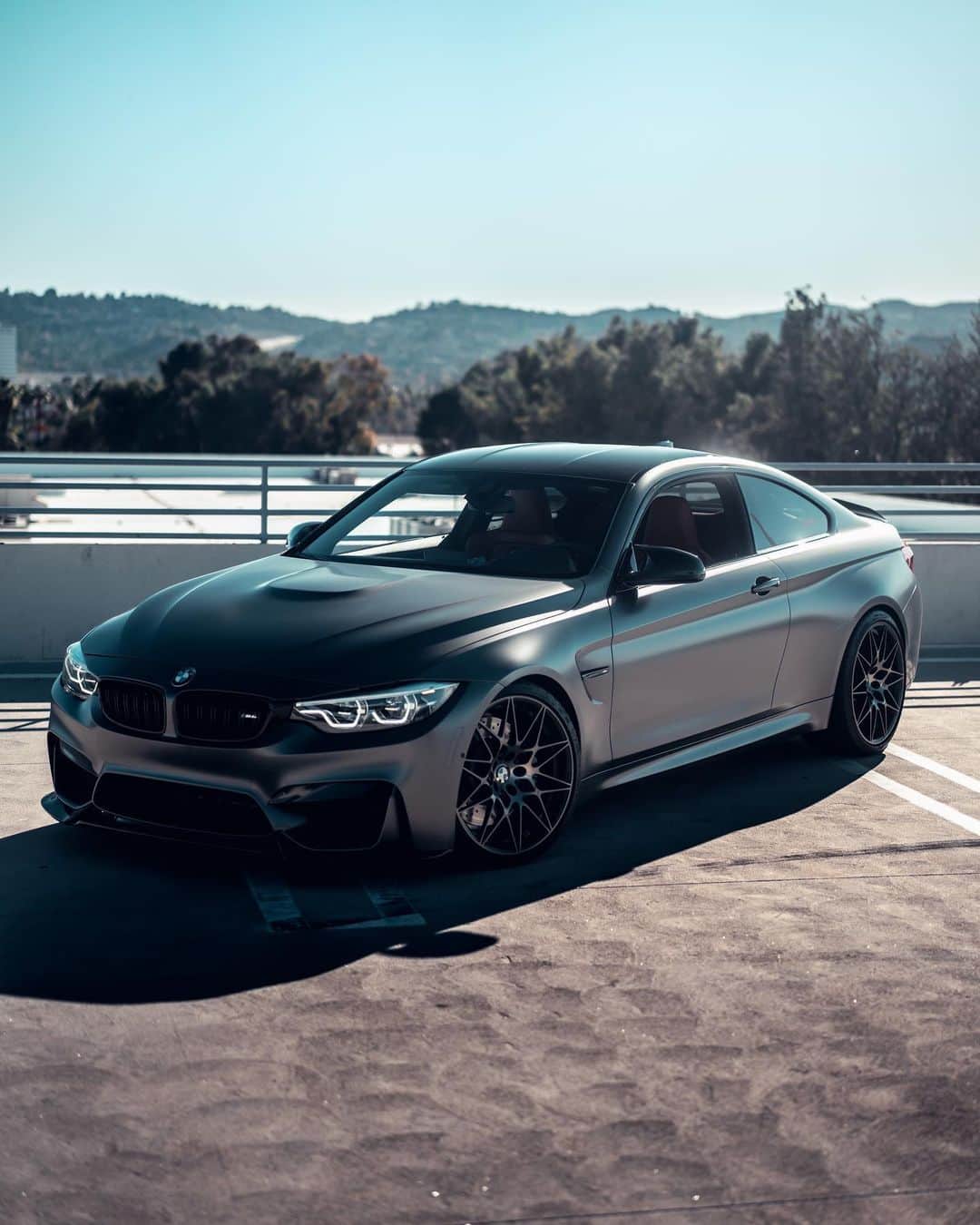 BMWのインスタグラム：「Sets the bar high, then clears it.  The BMW M4 Coupé. #BMWrepost @stealthm4 @limerockm3  #BMW #M4 #BMWM __ BMW M4 Coupé: Fuel consumption in l/100 km (combined): 10.0 - 9.9 (9.3). CO2 emissions in g/km (combined): 227 - 225 (213 - 211). The figures in brackets refer to the vehicle with seven-speed M double-clutch transmission with Drivelogic. The values of fuel consumptions, CO2 emissions and energy consumptions shown were determined according to the European Regulation (EC) 715/2007 in the version applicable at the time of type approval. The figures refer to a vehicle with basic configuration in Germany and the range shown considers optional equipment and the different size of wheels and tires available on the selected model. The values of the vehicles are already based on the new WLTP regulation and are translated back into NEDC-equivalent values in order to ensure the comparison between the vehicles. [With respect to these vehicles, for vehicle related taxes or other duties based (at least inter alia) on CO2-emissions the CO2 values may differ to the values stated here.] The CO2 efficiency specifications are determined according to Directive 1999/94/EC and the European Regulation in its current version applicable. The values shown are based on the fuel consumption, CO2 values and energy consumptions according to the NEDC cycle for the classification. For further information about the official fuel consumption and the specific CO2 emission of new passenger cars can be taken out of the „handbook of fuel consumption, the CO2 emission and power consumption of new passenger cars“, which is available at all selling points and at https://www.dat.de/angebote/verlagsprodukte/leitfaden-kraftstoffverbrauch.html.」