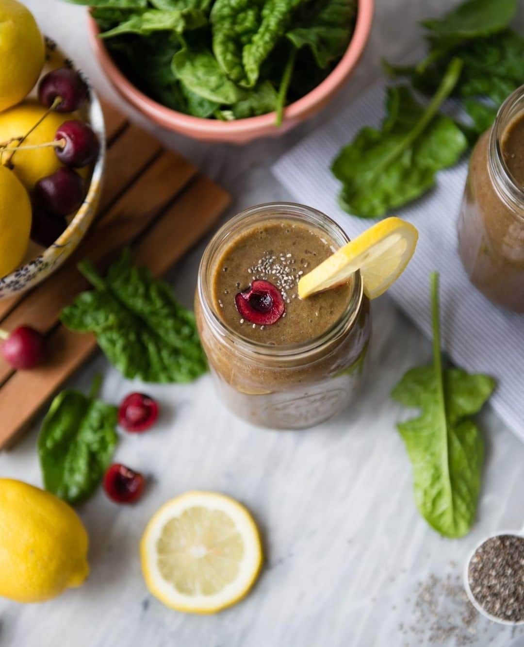 Simple Green Smoothiesさんのインスタグラム写真 - (Simple Green SmoothiesInstagram)「When life gives you lemons 🍋, make CHERRY LEMONADE! ﻿ ﻿ FYI: Cherries🍒, particularly the tart variety, are one of the best low- glycemic fruits out there. They are loaded with anthocyanins which provide anti-inflammatory benefits and can help prevent muscle soreness after exercise. Cherries are also a natural source of melatonin, the hormone that helps control sleep.﻿ ﻿ CHERRY LEMONADE I serves one﻿ 2 cups spinach, fresh﻿ 2 cups coconut water, unsweetened ﻿ 2 cups cherries, frozen﻿ 1 green apple, cored﻿ Juice from one lemon﻿ 2 tablespoons chia seeds﻿ ﻿ #greensmoothie #smoothie #plantbased #thrive #mealplans #cleanse #reset #vegan #vegetarian」6月17日 22時37分 - simplegreensmoothies
