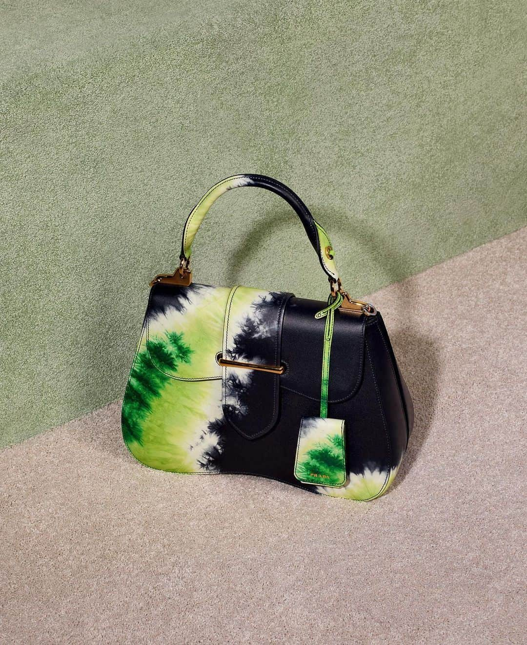 barneysnyofficialさんのインスタグラム写真 - (barneysnyofficialInstagram)「The @prada tie-dye Sidonie shoulder bag is the nowstalgia piece you’ve been looking for. Shop the groovy bag online and in-store now. Photographed by: @tinatyrell」6月18日 0時53分 - barneysny