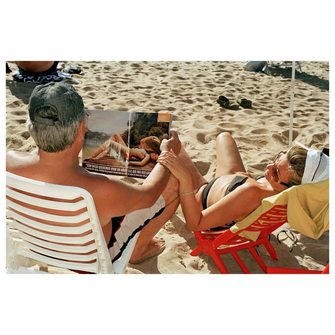 Magnum Photosさんのインスタグラム写真 - (Magnum PhotosInstagram)「'Life's a Beach, a new exhibition of @martinparrstudio's beach photographs, opens at the gates of the public gardens in Bordeaux today curated by @lacompagnieculturelle. This is a chance to see a collection of 23 classic images by the British photographer, capturing with great humor the peculiarities of his fellow human beings on the beach. . For more information, please visit magnumphotos.com/events/. . PHOTO: Uruguay. Punta del Este. Reading and sunbathing on the beach. 2006. . © @martinparrstudio/#MagnumPhotos . #MartinParr @libertebordeaux2019」6月18日 18時00分 - magnumphotos