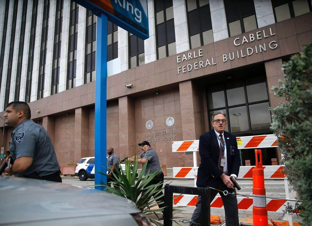 TIME Magazineさんのインスタグラム写真 - (TIME MagazineInstagram)「A heavily armed, masked gunman opened fire at a federal courthouse in downtown #Dallas on June 17. The shooter, identified as a 22-year-old, was fatally shot in an “exchange of gunfire” with federal officers, according to the city's police department. Veteran @dallasnews photographer Tom Fox, who was at the scene for a routine assignment, captured intense images as the shooting unfolded. “I squeezed off a few frames as he picked something up—a clip, I think—and then I turned and ran,” he recalled in an account to his newspaper. Fox hid behind a column and “just kept thinking, 'He's going to look at me around that corner and he's going to shoot.” In these photographs: a security guard and a civilian run for cover as bullets ricochet off the building as a shooter (far background, left) fires towards them; federal employees take cover behind a car in a parking lot; security officers, left, and a member of the U.S. Marshals Service, right, head towards the downed gunman; and the shooter is tended to in a parking lot. No officers or citizens were reported injured. Read more at the link in bio. Photographs by Tom Fox (@weatherfox)—@dallasnews/@apnews」6月18日 21時38分 - time
