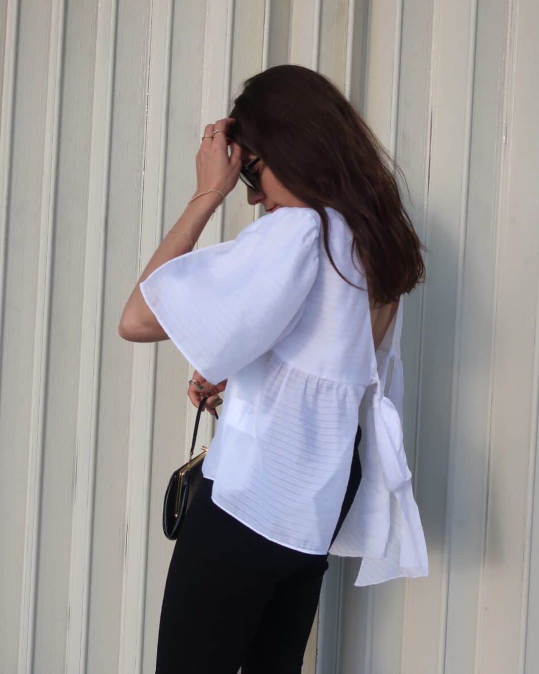 Club Monacoのインスタグラム：「A flutter sleeve and an oversized bow for those who #loveagoodwhitetop.」