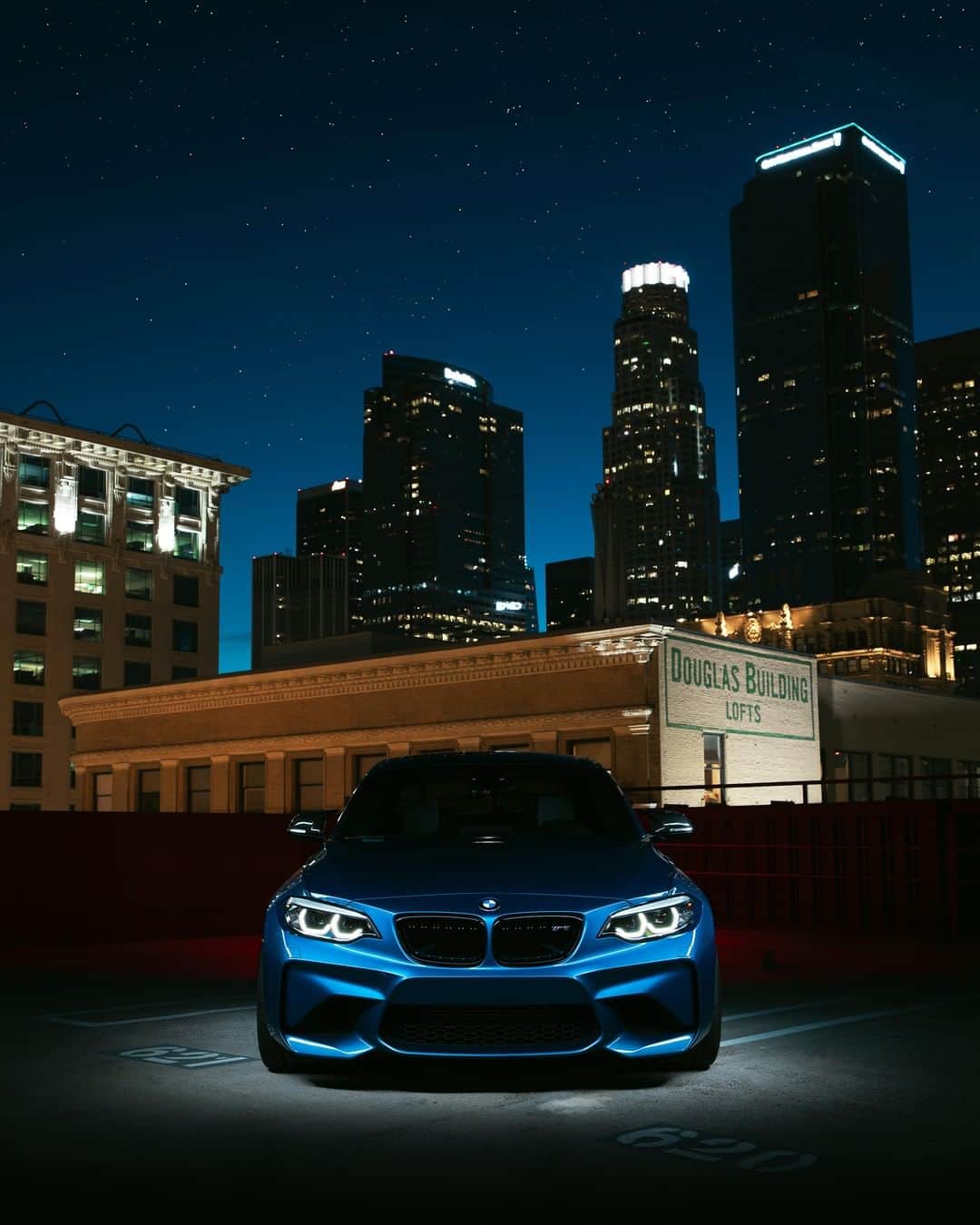 BMWのインスタグラム：「Stands by you night after night. The BMW M2 Coupé. #BMWrepost @prodigym2 @possiblychinese #BMW #M2 #BMWM __ BMW M2 Coupé: Fuel consumption in l/100 km (combined): 8.5. CO2 emissions in g/km (combined): 199. The values of fuel consumptions, CO2 emissions and energy consumptions shown were determined according to the European Regulation (EC) 715/2007 in the version applicable at the time of type approval. The figures refer to a vehicle with basic configuration in Germany and the range shown considers optional equipment and the different size of wheels and tires available on the selected model. The values of the vehicles are already based on the new WLTP regulation and are translated back into NEDC-equivalent values in order to ensure the comparison between the vehicles. [With respect to these vehicles, for vehicle related taxes or other duties based (at least inter alia) on CO2-emissions the CO2 values may differ to the values stated here.] The CO2 efficiency specifications are determined according to Directive 1999/94/EC and the European Regulation in its current version applicable. The values shown are based on the fuel consumption, CO2 values and energy consumptions according to the NEDC cycle for the classification. For further information about the official fuel consumption and the specific CO2 emission of new passenger cars can be taken out of the „handbook of fuel consumption, the CO2 emission and power consumption of new passenger cars“, which is available at all selling points and at https://www.dat.de/angebote/verlagsprodukte/leitfaden-kraftstoffverbrauch.html.」