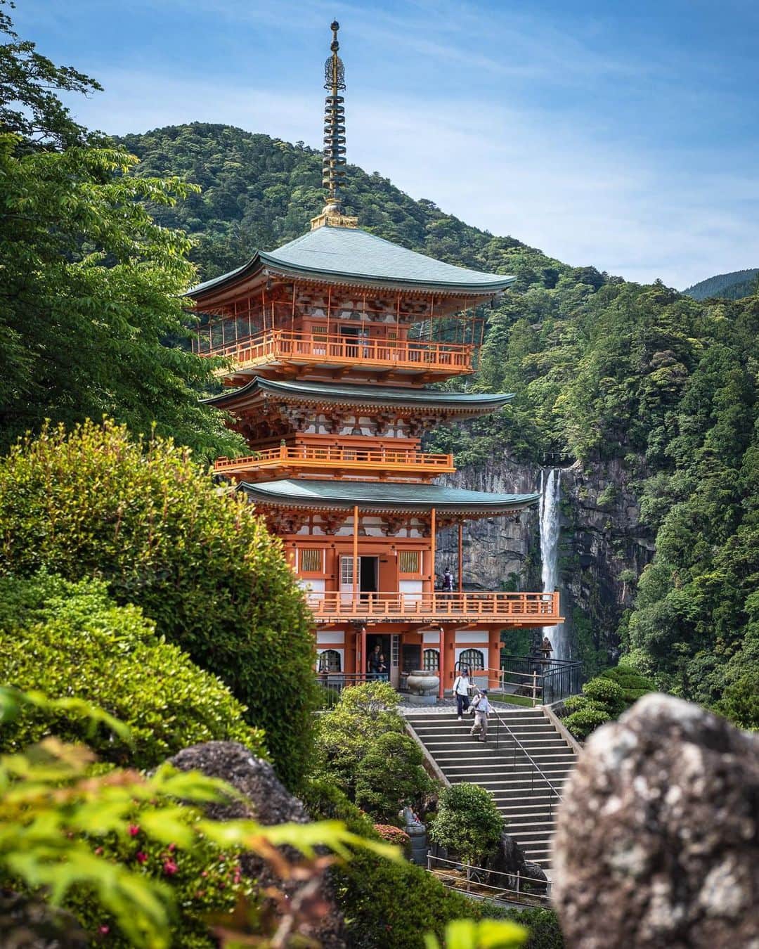 National Geographic Travelさんのインスタグラム写真 - (National Geographic TravelInstagram)「Photo by @michaelclarkphoto | A three-storied pagoda at Nachi Falls near Nachi, Japan. With a stunning 133-meter waterfall in the background, this entire village takes on a surreal feeling of ethereal beauty. This is also where the Kumano Kodo Pilgrimage ends, which is a UNESCO World Heritage site. This 307-km (191-mile) route has been walked for over a thousand years. #nachifalls #japan」6月20日 4時39分 - natgeotravel