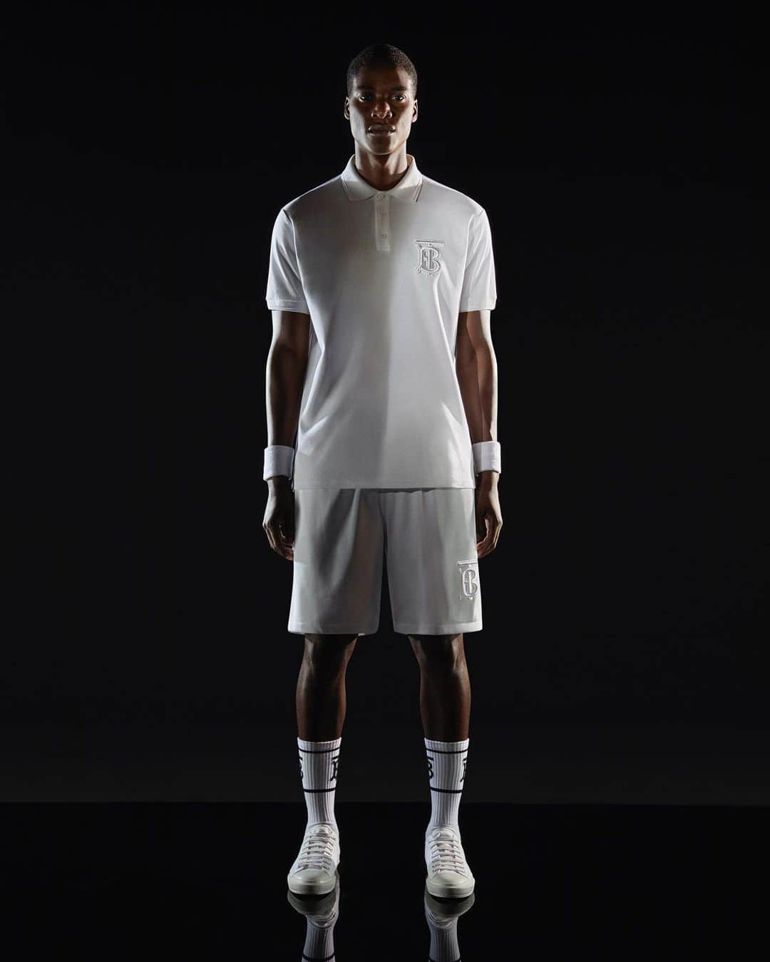 Burberryさんのインスタグラム写真 - (BurberryInstagram)「Shop now – Tennis Whites . The Monogram motif polo shirt is styled with a classic sports short, together appliquéd with the white-on-white #ThomasBurberryMonogram . Fusing design cues from our archive styles – in formal tailored shapes designed in the late 19th century, to more casual cuts from the 20th century – with iconic tennis details, such as sharp pleats and form-fitting cotton piqué fabric . #TBRT」6月19日 23時30分 - burberry