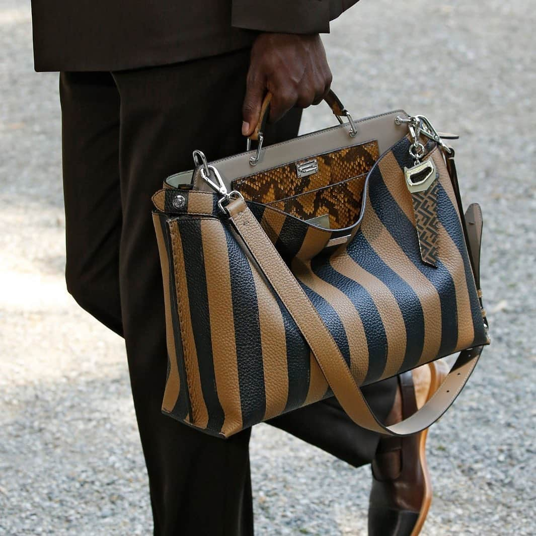 Fendiさんのインスタグラム写真 - (FendiInstagram)「The signature Fendi FF logo and striped Pequin pattern highlight the accessories of the Collection, resulting in a skillful play of logos and textures. #FendiSS20 #FendiPeekaboo  Creative Director @silviaventurinifendi」6月20日 18時46分 - fendi