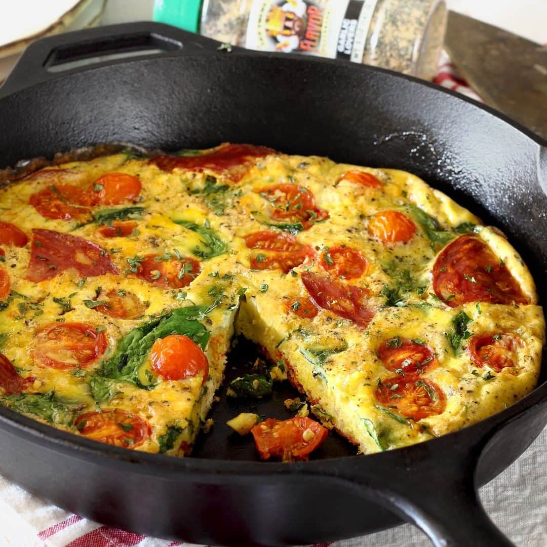 Flavorgod Seasoningsさんのインスタグラム写真 - (Flavorgod SeasoningsInstagram)「TOMATO & CHORIZO FRITTATA⠀ ⠀ Simple and healthy frittata with great flavors that takes very little time to get oven-ready. Recipe features FLAVOR GOD GARLIC LOVERS Seasoning.⠀ ⠀ *From @paleo_newbie_recipes:⠀ ⠀ INGREDIENTS⠀ ⠀ 1 Tbsp of cooking oil⠀ 1/2 cup diced onion⠀ 3 oz sliced chorizo, rough chopped⠀ 1 cup fresh spinach leaves⠀ 8 eggs, whisked⠀ 1/3 cup coconut milk⠀ 1 cup halved cherry tomatoes⠀ FLAVOR GOD GARLIC LOVERS Seasoning⠀ ⠀ INSTRUCTIONS⠀ ⠀ 1. Preheat oven to 350ºF.⠀ --⠀ 2. Whisk eggs together with coconut milk and season mixture generously with FLAVOR GOD GARLIC LOVERS Seasoning. Set aside.⠀ --⠀ 3. Heat oil in an oven-safe 10-inch skillet to medium on the stovetop and add the onions. Sauté 3-4 minutes, then add the chopped chorizo. Cook 3 more minutes and then add the spinach leaves. After a quick stir, add the whisked eggs/coconut milk mixture and finally top with cherry tomato halves. Immediately place skillet in 350ºF oven. Bake undisturbed until eggs are cooked through, around 20-25 minutes.⠀ --⠀ 4. Carefully remove hot skillet from oven, season frittata with salt and pepper if desired. Slice, serve and enjoy!  Yields 6-8 slices.⠀ ⠀ -⠀ -⠀ #food #foodie #flavorgod #seasonings #glutenfree #mealprep  #keto #paleo #vegan #kosher #breakfast #lunch #dinner #yummy #delicious #foodporn」6月20日 21時00分 - flavorgod
