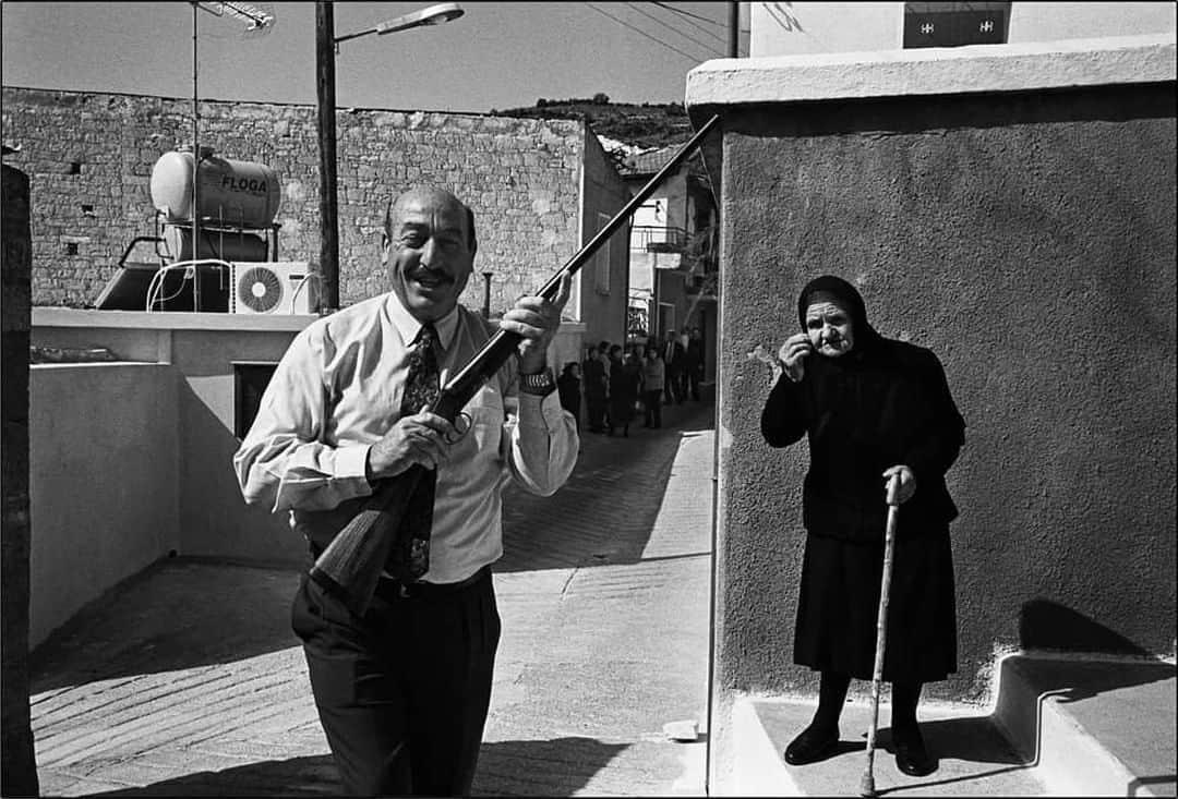 のインスタグラム：「A week after Easter villagers from Omodos, Cyprus traditionally welcome a procession by shooting their hunting guns into the air. Documentary photographer Andreas Vassiliou (@andreasvassiliou.photography) captured this magical moment with his Leica M6 and a 35mm Summicron lens. Which local traditions would you most like to photograph?  #LeicaCamera #Leica #🔴📷 #Leicagram #LeicaM6 #TheLeicaLook #Leica_World #Leica_Club #Leica_Society #LeicaPhoto #bnw_world #bnw_street #streetphotography #life_is_street #everybodystreet #analogphotography #documentaryphotography #cyprus」