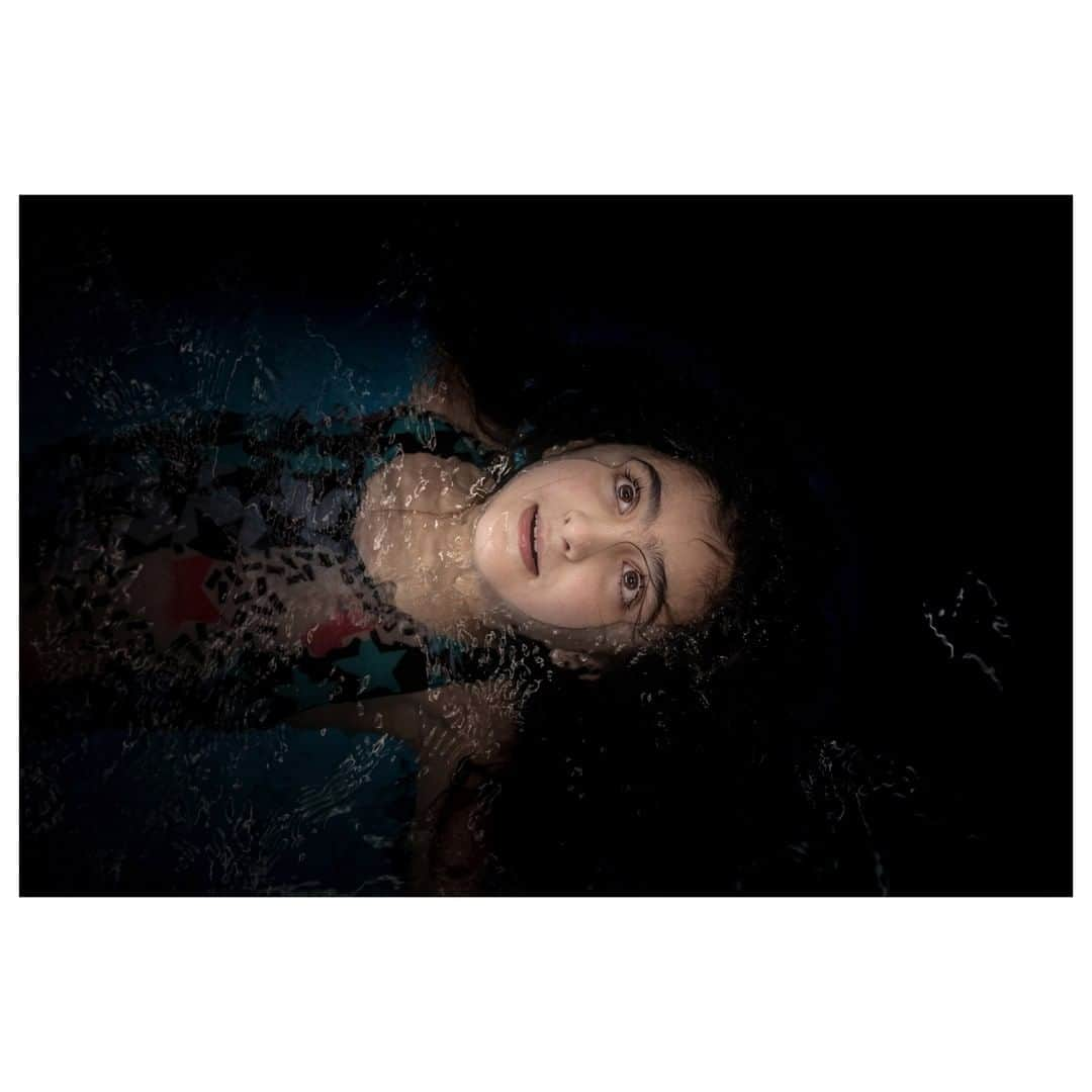 Magnum Photosさんのインスタグラム写真 - (Magnum PhotosInstagram)「In 2017, Diana @markosian was working in Germany, documenting a family of Afghan migrants and their efforts to acclimatise to their new homeland, when a young boy’s chance comment regarding his fear of water set her mind on course toward a new body of work. A wilful effort to cover the migrant crisis from an alternate perspective, and an interest in incorporating the voices of her subjects led @markosian to make The Big Sea, a study of young migrants overcoming their fears through swimming lessons. . On World Refugee Day, we speak to @markosian about the project. Link in bio. . PHOTO: Sulin, 7, learns how to float on her back. When she started her lessons, her biggest fear was being alone in the water. When I showed her this image of herself, she smiled, "It can't be me," she said. "I never thought I could be on my back." Wolfsburg, Germany. 2018. . © @markosian/#MagnumPhotos . #WorldRefugeeDay」6月20日 23時00分 - magnumphotos