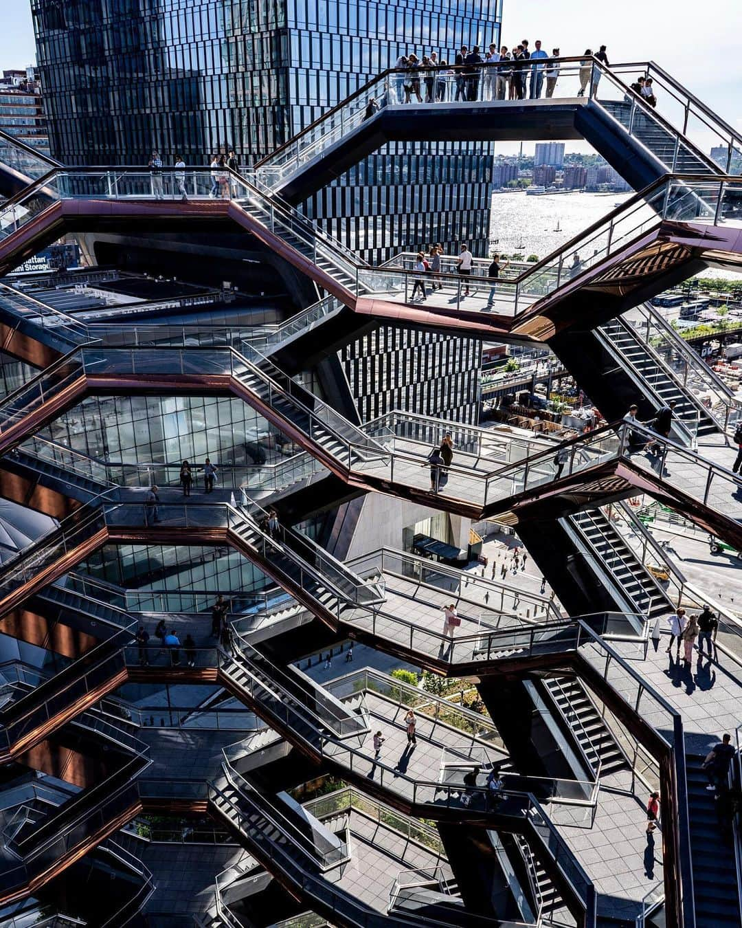 National Geographic Travelさんのインスタグラム写真 - (National Geographic TravelInstagram)「Photo by @ErikaSkogg | The Vessel, an interactive art installation in New York City, offers visitors a new way to climb above the city and nearby Hudson River through connected staircases. For photographers, it's the ultimate playground for shapes, vantage points, and silhouetted compositions. The experience is also completely free, but space is limited so it's recommended to reserve an entry time online before you go.」6月21日 1時25分 - natgeotravel