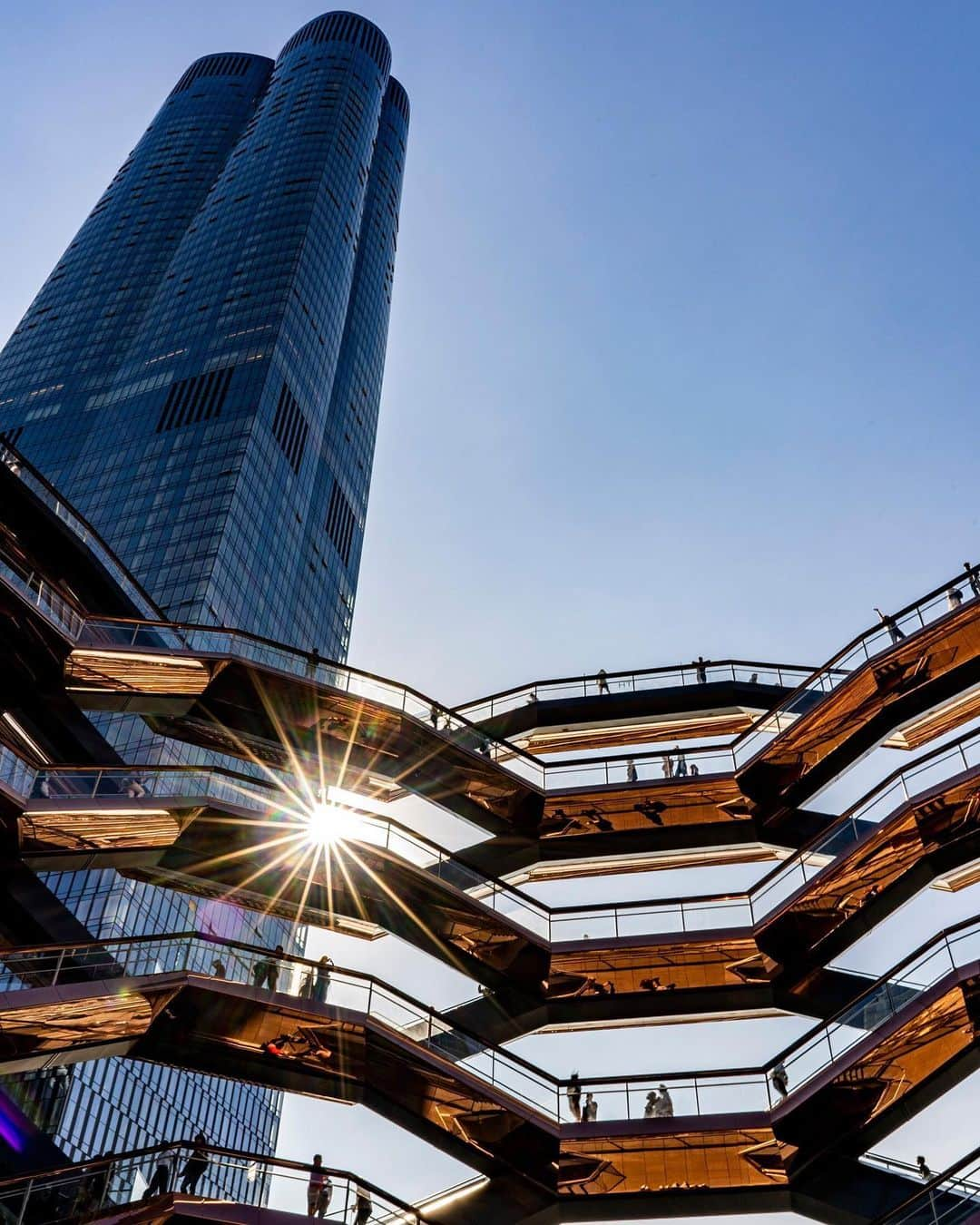 National Geographic Travelさんのインスタグラム写真 - (National Geographic TravelInstagram)「Photo by @ErikaSkogg | The Vessel, an interactive art installation in New York City, offers visitors a new way to climb above the city and nearby Hudson River through connected staircases. For photographers, it's the ultimate playground for shapes, vantage points, and silhouetted compositions. The experience is also completely free, but space is limited so it's recommended to reserve an entry time online before you go.」6月21日 1時25分 - natgeotravel