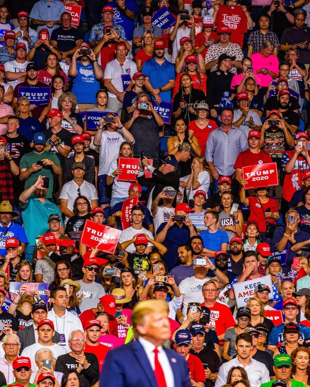 TIME Magazineさんのインスタグラム写真 - (TIME MagazineInstagram)「At its core, @realdonaldtrump's campaign is a kind of a perpetual outrage machine. It uses algorithms—automated settings on Internet platforms like Google and Facebook—to place massive digital ad buys anytime #Trump creates a firestorm. The cycle is simple: Trump says something controversial or offensive; that drives a surge of search interest in the topic; and that gives his campaign an opening to serve up online ads. The ads encourage supporters to text the campaign, take single-question campaign-generated polls, and buy Trump hats, yard signs, beer coolers and WITCH HUNT decals from the campaign online store, all of which rakes in voter contact data. Never before has an incumbent President run a campaign this way. “It is a strategy built for the new partisan era,” says Princeton University presidential historian Julian Zelizer. “Candidates are always doing things to turn out their supporters. What has not been tested, at least in modern times, is a strategy in which all the rhetoric and all the policy is just tailored around the turnout crowd and there is no effort to go beyond it.” Read more at the link in bio. Photographs by @davidwilliamsphoto—@reduxpictures for TIME」6月21日 2時21分 - time