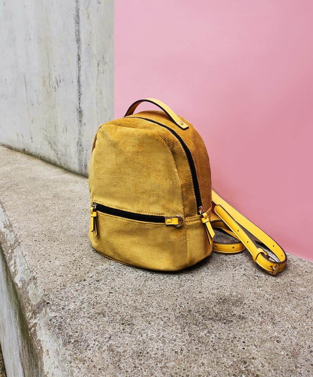 アクセサライズのインスタグラム：「Make a statement with our yellow corduroy mini backpack. This plush design is perfect for everyday styling, featuring a front pocket for the easy-reach essentials. 🔍7901309800. Tap the link in the bio to shop now.  #Accessorize」