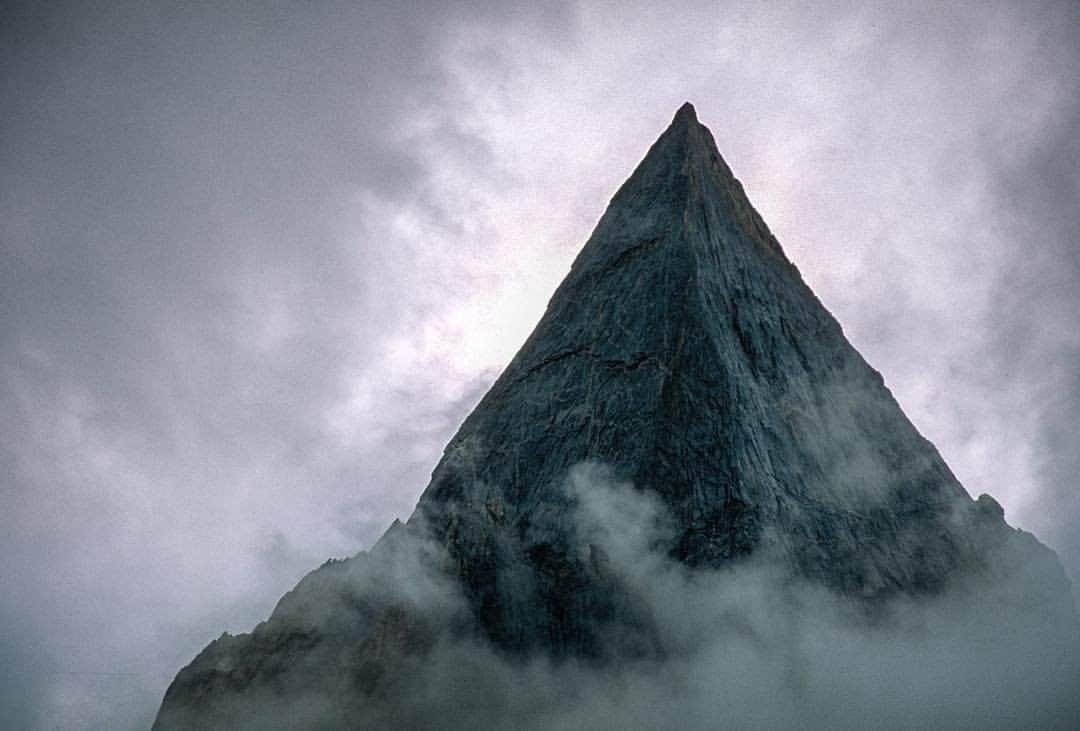のインスタグラム：「Photo by Jimmy Chin @jimmychin | When the real mountain surpasses the mountains of your imagination...Naysar Peak, Karakoram, Pakistan. This symmetrical oddity of a mountain can be found in a remote valley in northwestern Pakistan and was first climbed by Galen Rowell, Conrad Anker, and Peter Croft. For more images from alpine adventures around the world, follow @jimmychin.」