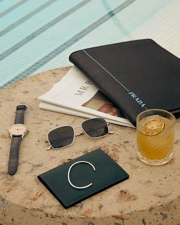 MR PORTERのインスタグラム：「Sunnies? Check. ⁣⠀ Shorts? Check.⁣⠀ Now we just need to find a sun lounger...⁣⠀ -⁣⠀ 🛒 Prada Pouch (1095255), The Row Sunglasses (1124901), Le Gramme Cuff (1074444), Valextra Passport Cover (1095456) and Montblanc Heritage Pulsograph Watch (1168701) available now via the link in bio. #MRPORTER」