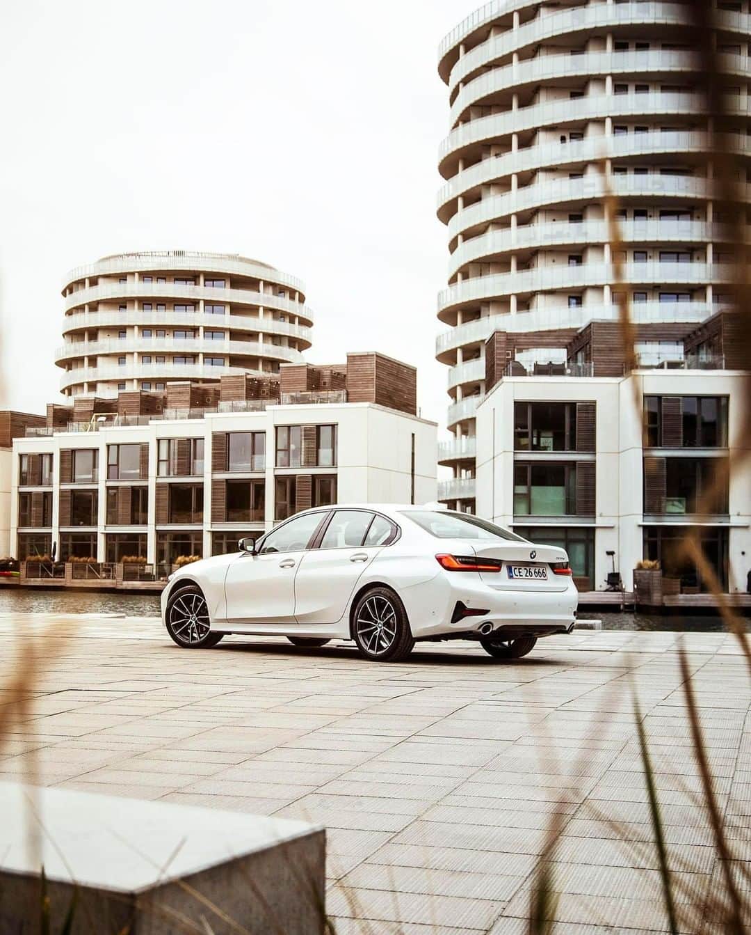 BMWのインスタグラム：「The weather may change, but the performance is permanent. The BMW 3 Series Sedan. #BMWrepost @larskrogsgaardphoto #BMW #3Series __ BMW 320d Sedan: Fuel consumption in l/100 km (combined): 4.7 - 4.2. CO2 emissions in g/km (combined): 122 - 110. The values of fuel consumptions, CO2 emissions and energy consumptions shown were determined according to the European Regulation (EC) 715/2007 in the version applicable at the time of type approval. The figures refer to a vehicle with basic configuration in Germany and the range shown considers optional equipment and the different size of wheels and tires available on the selected model. The values of the vehicles are already based on the new WLTP regulation and are translated back into NEDC-equivalent values in order to ensure the comparison between the vehicles. [With respect to these vehicles, for vehicle related taxes or other duties based (at least inter alia) on CO2-emissions the CO2 values may differ to the values stated here.] The CO2 efficiency specifications are determined according to Directive 1999/94/EC and the European Regulation in its current version applicable. The values shown are based on the fuel consumption, CO2 values and energy consumptions according to the NEDC cycle for the classification. For further information about the official fuel consumption and the specific CO2 emission of new passenger cars can be taken out of the „handbook of fuel consumption, the CO2 emission and power consumption of new passenger cars“, which is available at all selling points and at https://www.dat.de/angebote/verlagsprodukte/leitfaden-kraftstoffverbrauch.html.」