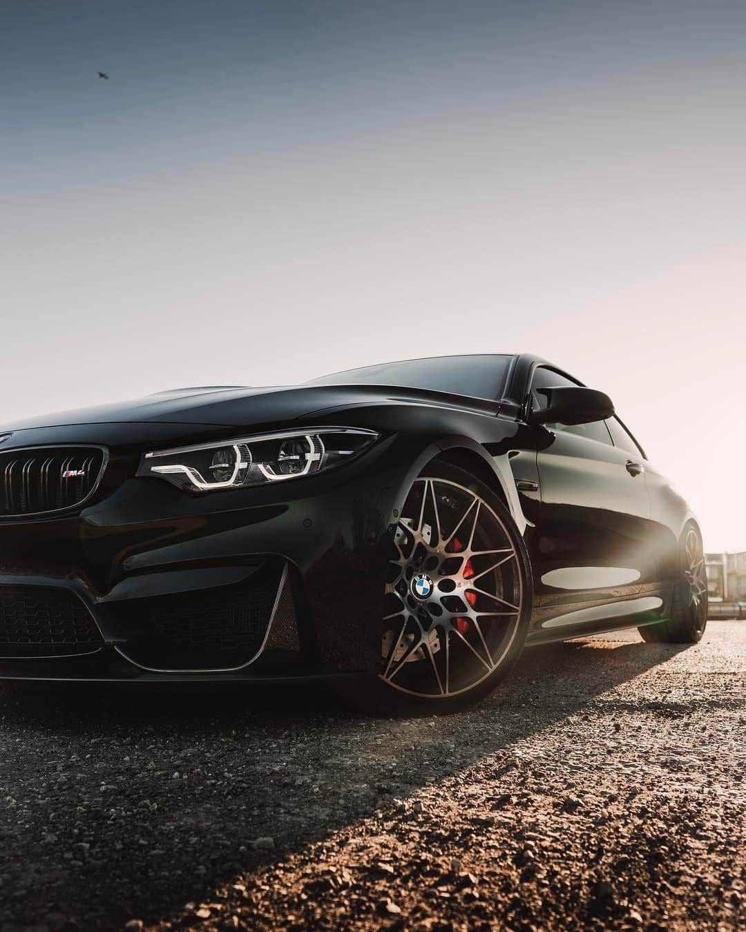 BMWのインスタグラム：「Powerful features and ethereal beauty. The BMW M4 Coupé. #BMWrepost @shadow_m4 #BMW #M4 #BMWM __ BMW M4 Coupé: Fuel consumption in l/100 km (combined): 10.2 - 9.9 (9.5 - 9.3). CO2 emissions in g/km (combined): 232 - 225 (217 - 211). The figures in brackets refer to the vehicle with seven-speed M double-clutch transmission with Drivelogic. The values of fuel consumptions, CO2 emissions and energy consumptions shown were determined according to the European Regulation (EC) 715/2007 in the version applicable at the time of type approval. The figures refer to a vehicle with basic configuration in Germany and the range shown considers optional equipment and the different size of wheels and tires available on the selected model. The values of the vehicles are already based on the new WLTP regulation and are translated back into NEDC-equivalent values in order to ensure the comparison between the vehicles. [With respect to these vehicles, for vehicle related taxes or other duties based (at least inter alia) on CO2-emissions the CO2 values may differ to the values stated here.] The CO2 efficiency specifications are determined according to Directive 1999/94/EC and the European Regulation in its current version applicable. The values shown are based on the fuel consumption, CO2 values and energy consumptions according to the NEDC cycle for the classification. For further information about the official fuel consumption and the specific CO2 emission of new passenger cars can be taken out of the „handbook of fuel consumption, the CO2 emission and power consumption of new passenger cars“, which is available at all selling points and at https://www.dat.de/angebote/verlagsprodukte/leitfaden-kraftstoffverbrauch.html.」