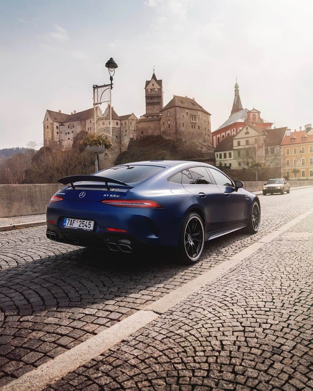 Mercedes AMGさんのインスタグラム写真 - (Mercedes AMGInstagram)「[Fuel consumption combined: 11.3 l/100km | CO2 emissions combined: 257 g/km]  The streets of Loket are even more gorgeous in the presence of the Mercedes-AMG GT 63 S 4MATIC+ 4-Door Coupé!  Photos: @ranier_fernandez_photography for #MBsocialcar  #MercedesAMG #AMGGTFAMILY #GT63 #DrivingPerformance」5月30日 18時00分 - mercedesamg