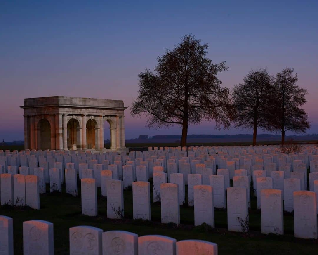 National Geographic Travelさんのインスタグラム写真 - (National Geographic TravelInstagram)「Photo by @simonnorfolkstudio I I've been working for a couple of years now on a project about the aftermath of the First World War. Adanac Military Cemetery is one of many burial grounds for those that died during the fighting, located near the French villages of Miraumont, Pys and Courcelette in Northern France. The cemetery was laid out after the Armistice of 11 November 1918, when graves were brought in from the Canadian battlefields around Courcelette and small cemeteries surrounding Miraumont. The cemetery was designed by Sir Herbert Baker and contains 3186 casualties of the war from the UK, Canada, Australia, New Zealand and South Africa. For more on this and other projects, follow me @simonnorfolkstudio Thanks to Jamie Marshall / @tribaleye for assistance with supplemental lighting. #simonnorfolk #memorial #firstworldwar #1918 #WW1 #somme #armistice #LestWeForget #cwgc #adnaccemetery #Miraumont #Courcelette」5月31日 10時02分 - natgeotravel