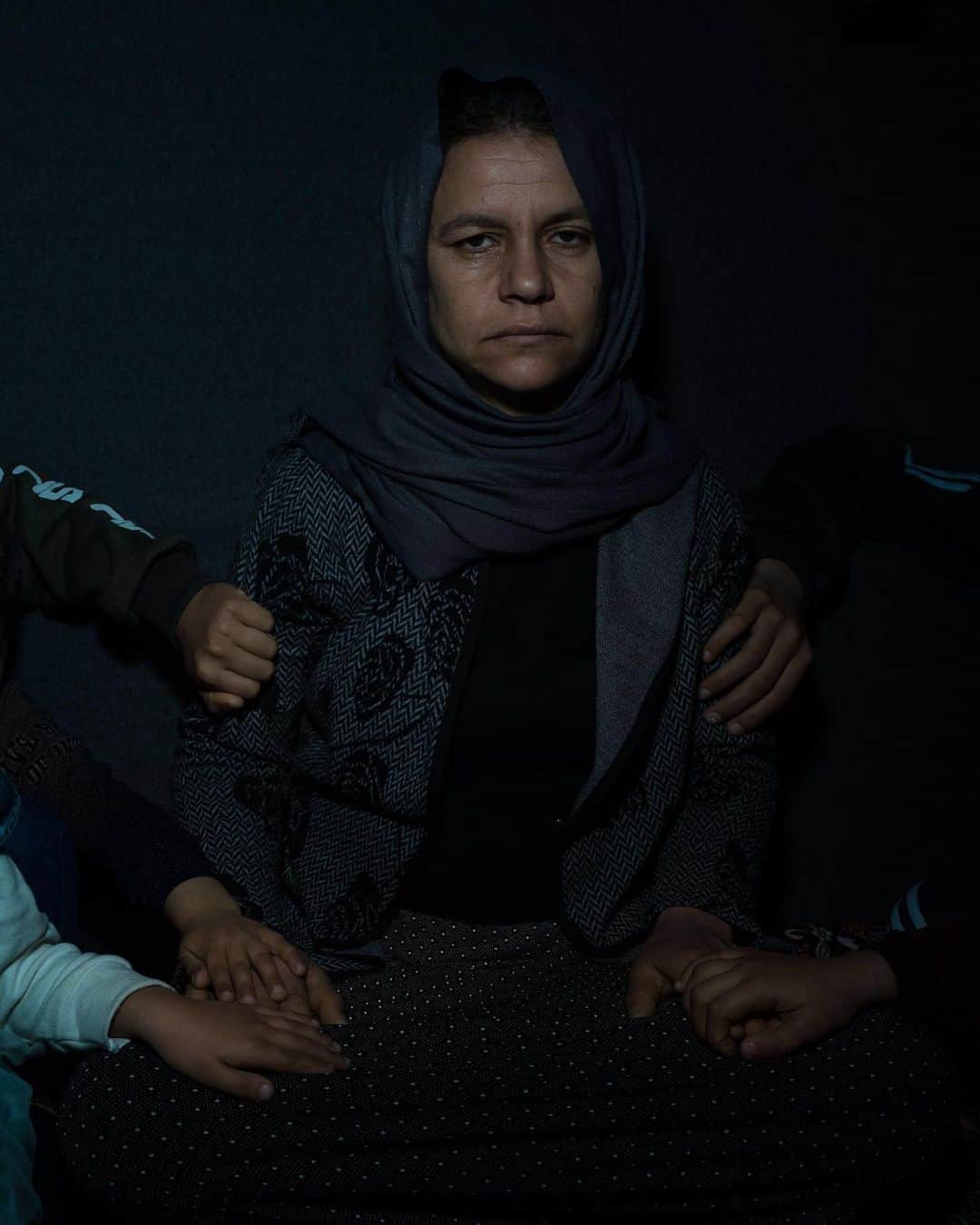TIME Magazineさんのインスタグラム写真 - (TIME MagazineInstagram)「Subha, 35, and the hands of her children. Photographed in February, they were captured by ISIS in 2014 and held as slaves until recently escaping the battle in Baghouz. One son who had been trained as a fighter led the way to safety. The recovery from trauma has immense implications not only for the individuals but also for international security. Yet the matter is muddled by conflicting agendas. Yezidi elders downplay the risk, while Baghdad, though obligated by international convention to rehabilitate child soldiers, ignores Yezidi boys and jails Sunnis as young as 13. There’s also uncertainty about the numbers involved. Out of the roughly 6,400 Yezidis taken by ISIS, 1,855 children had returned as of mid-February. Of the boys, around 300 ticked the box on the form admitting that they had fought for ISIS. The Kurdish government’s kidnapped affairs department thinks the number is much higher. Read more, and see more pictures, at the link in bio. Photograph by @newshatavakolian—@magnumphotos for TIME」5月31日 2時13分 - time